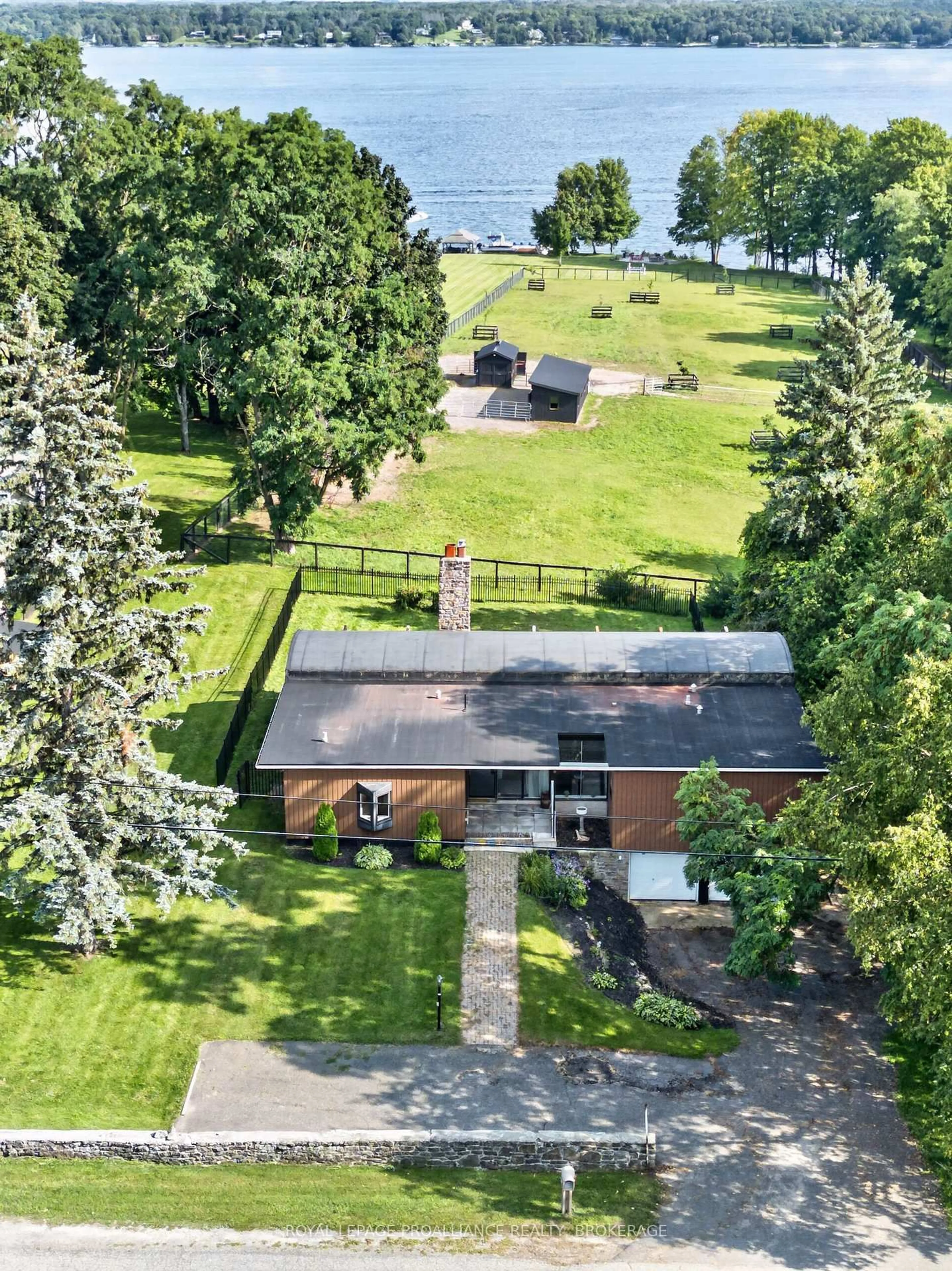 A pic from outside/outdoor area/front of a property/back of a property/a pic from drone, water/lake/river/ocean view for 1103 County Road 2, Augusta Ontario K6V 5T1