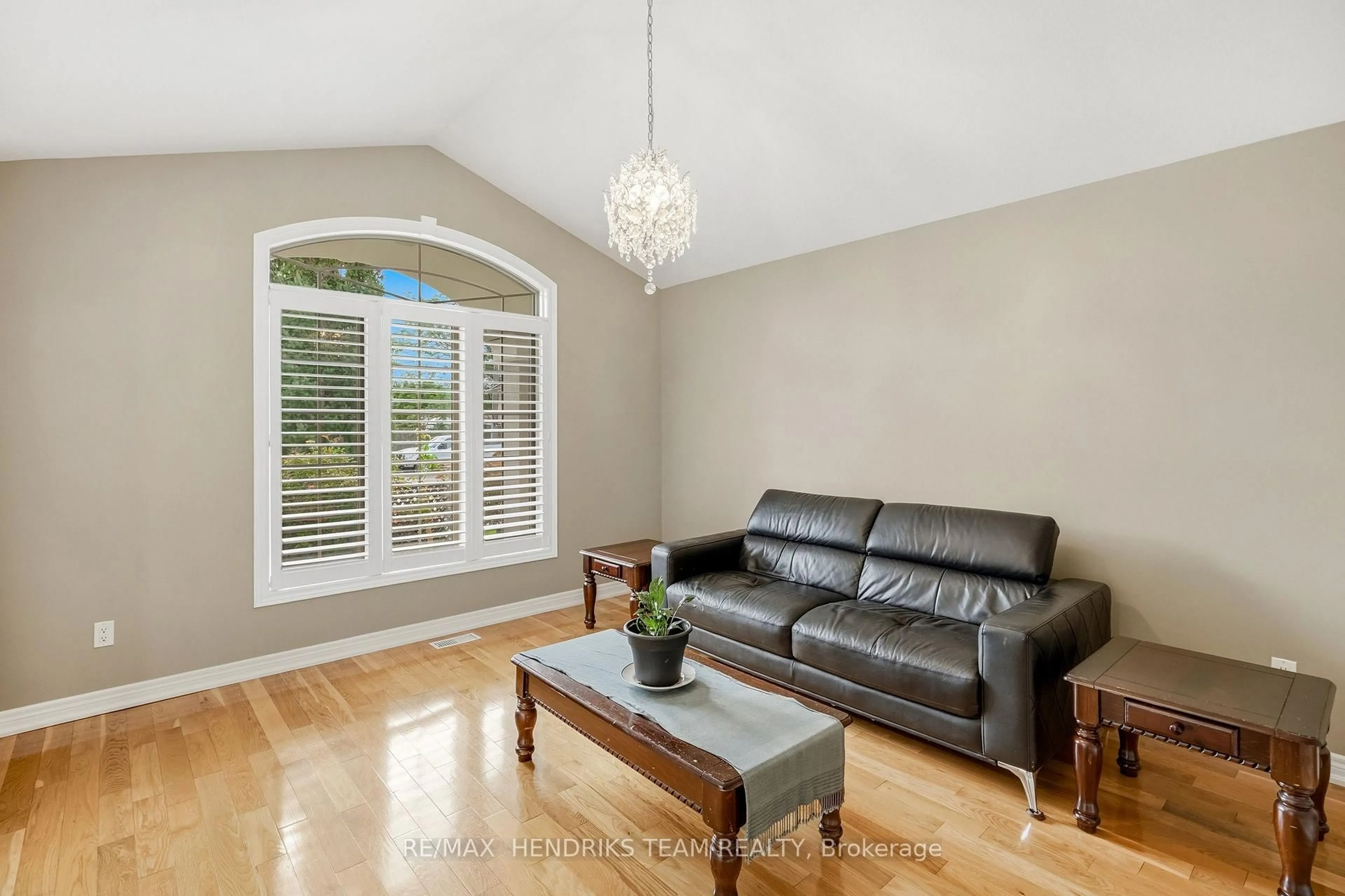 Living room with furniture, wood/laminate floor for 17 First Street Louth, St. Catharines Ontario L2W 1C7