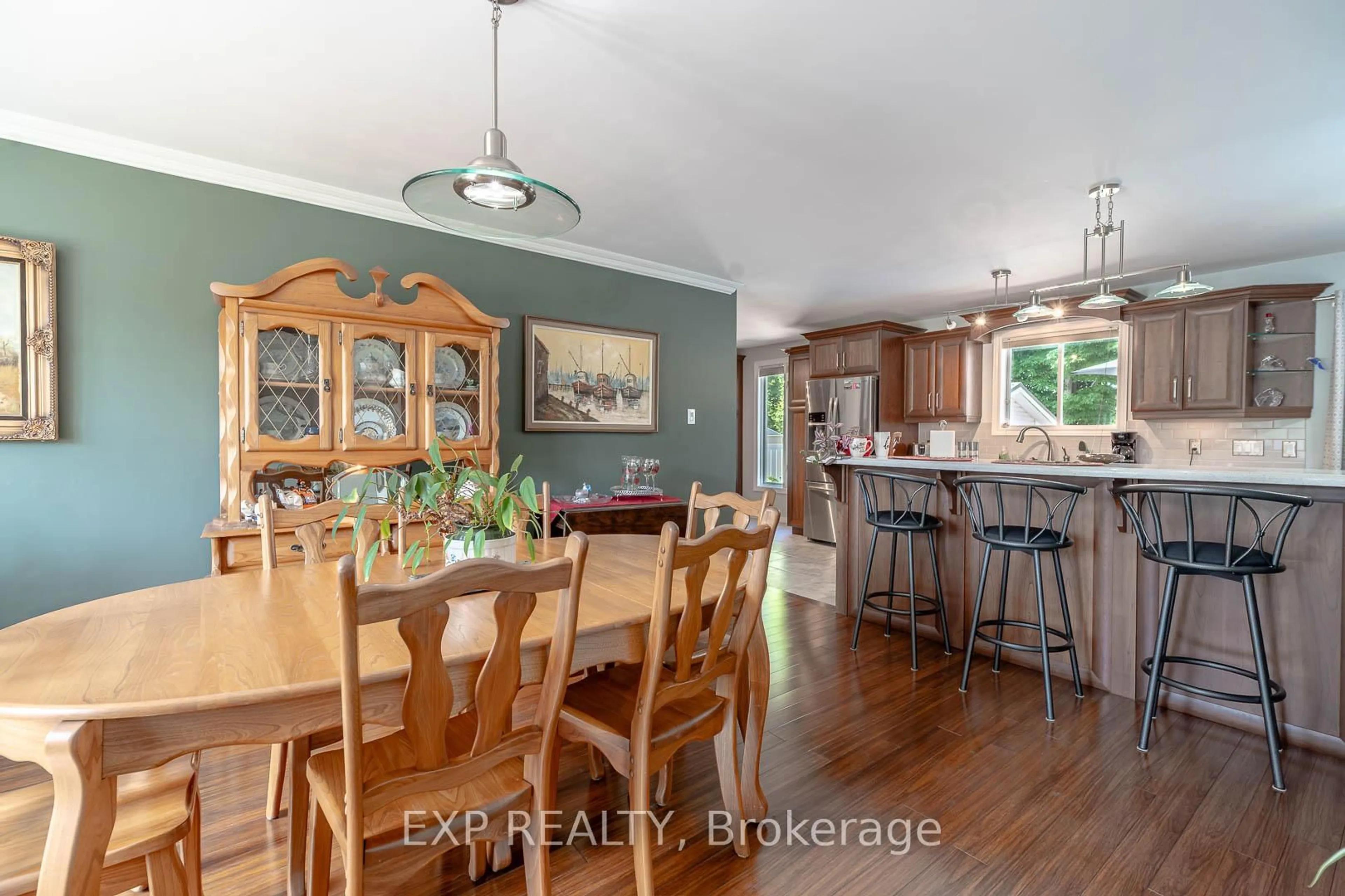 Open concept kitchen, wood/laminate floor for 10 Kathryn Cres, North Bay Ontario P1B 8P4