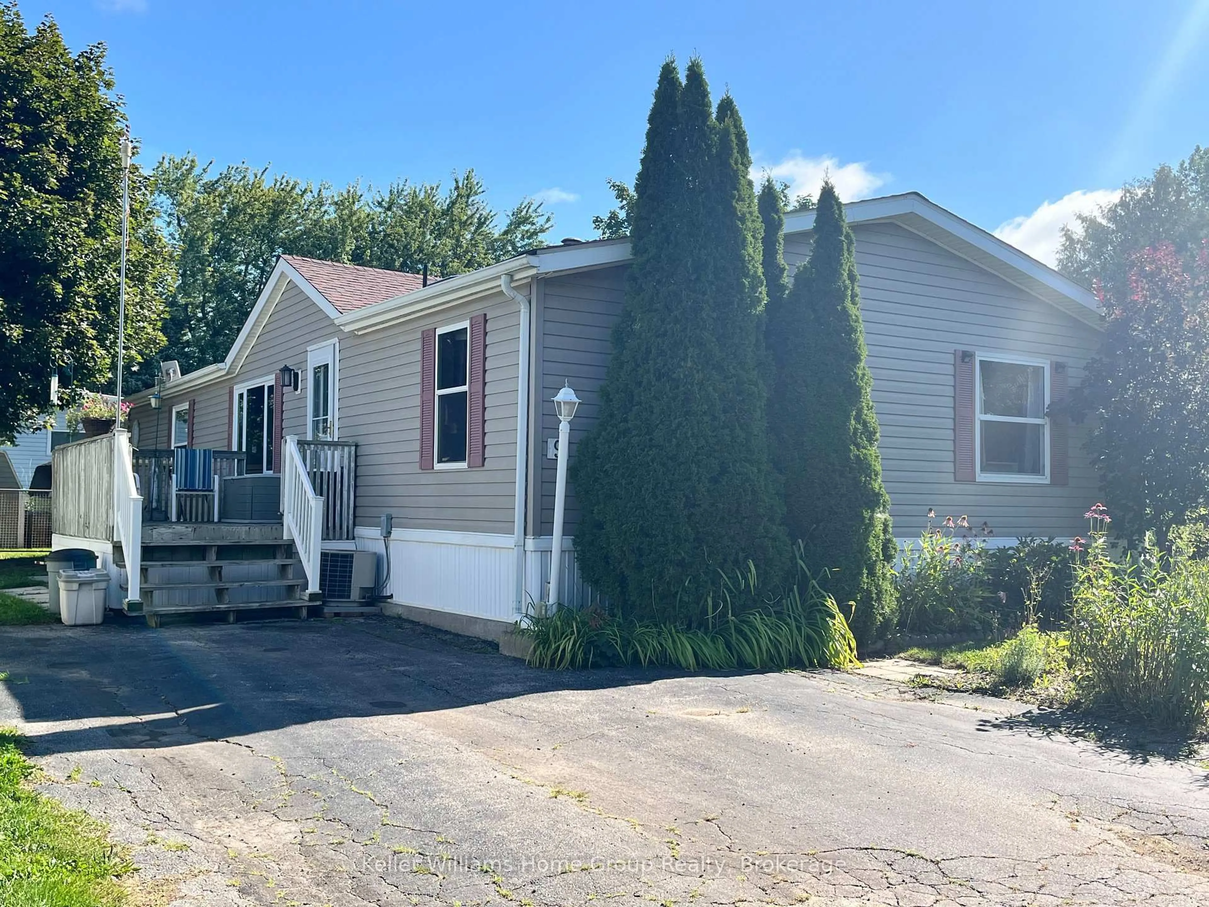 Home with vinyl exterior material, street for 9 First Ave, Centre Wellington Ontario N1M 2W5