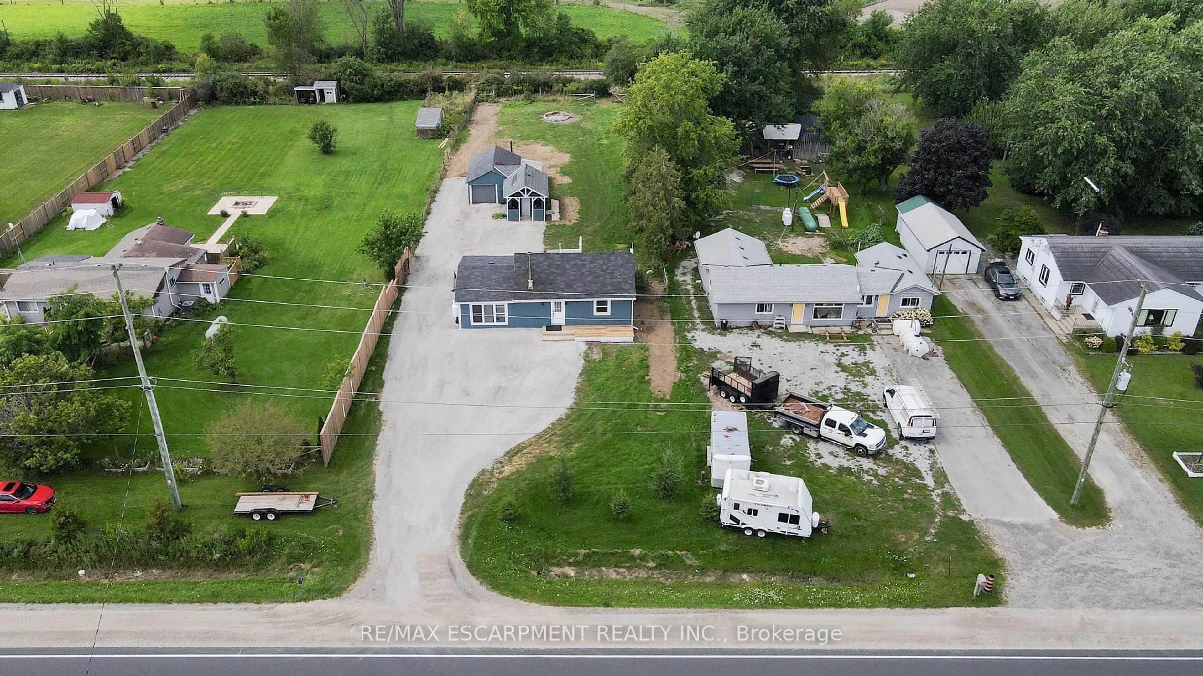 A pic from outside/outdoor area/front of a property/back of a property/a pic from drone, street for 3689 #6 Highway, Haldimand Ontario N0A 1H0