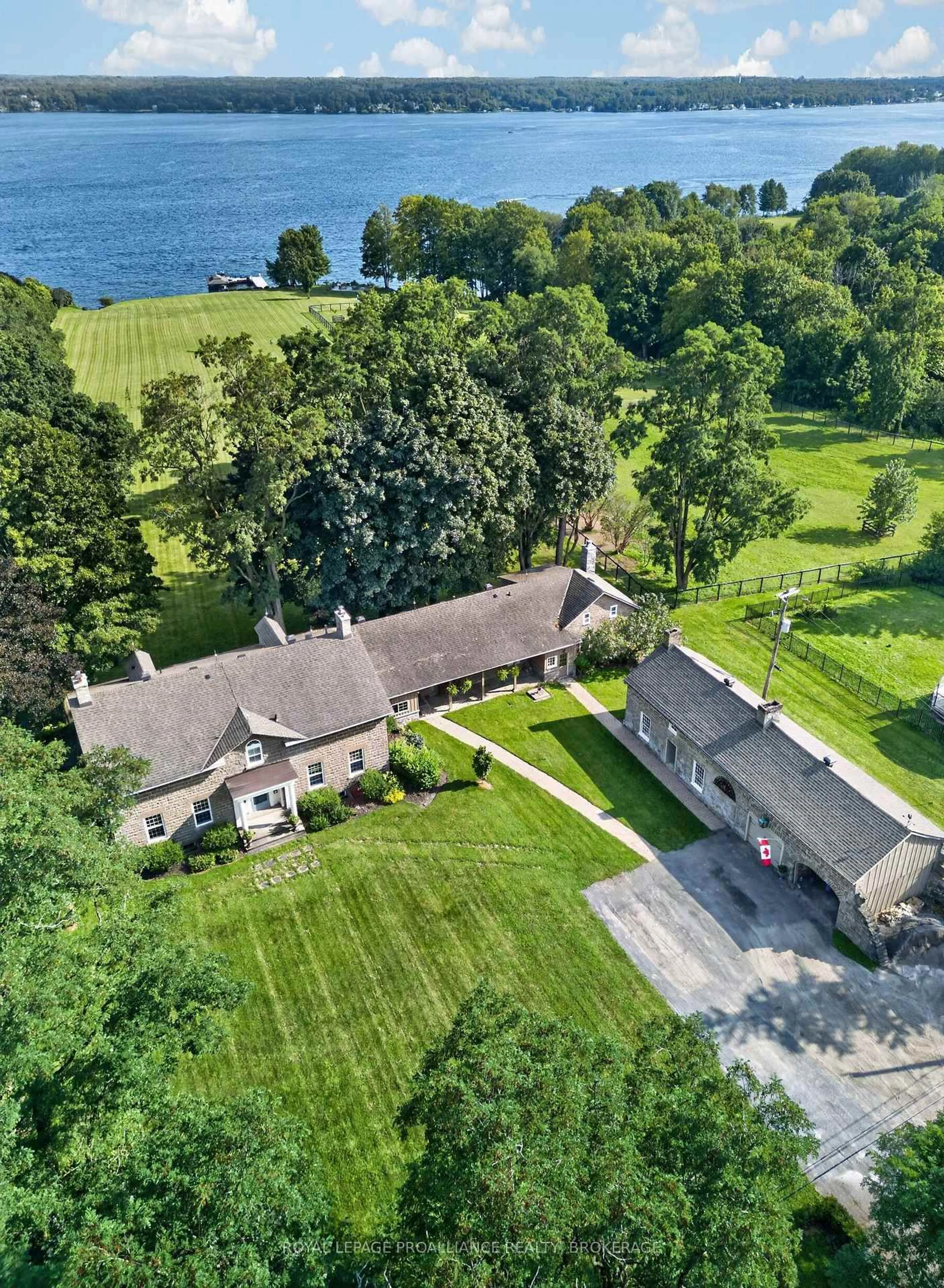 A pic from outside/outdoor area/front of a property/back of a property/a pic from drone, water/lake/river/ocean view for 1105 County Road 2, Augusta Ontario K6V 5T1