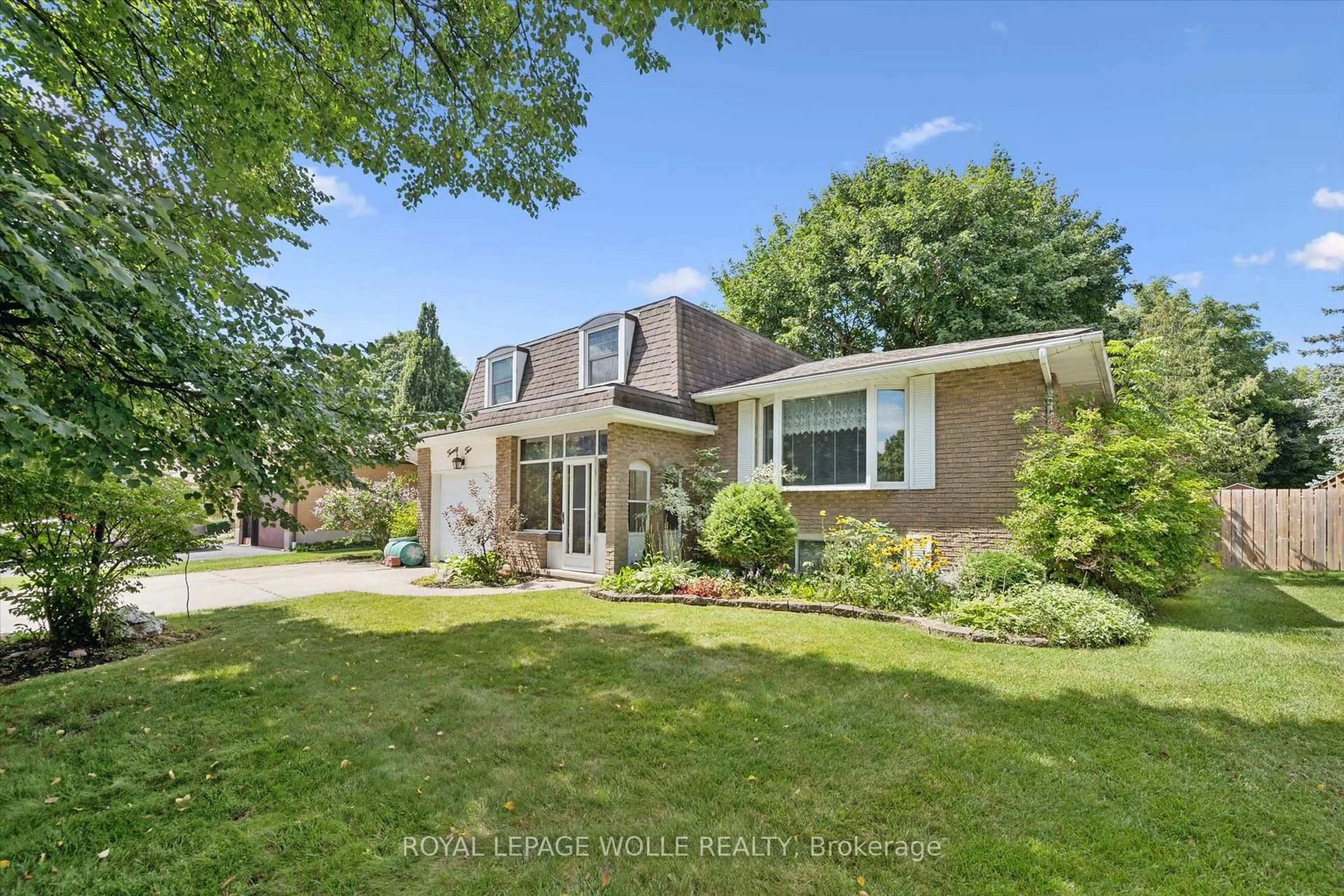 Home with brick exterior material, street for 22 Green Warbler Cres, Woolwich Ontario N3B 1A6