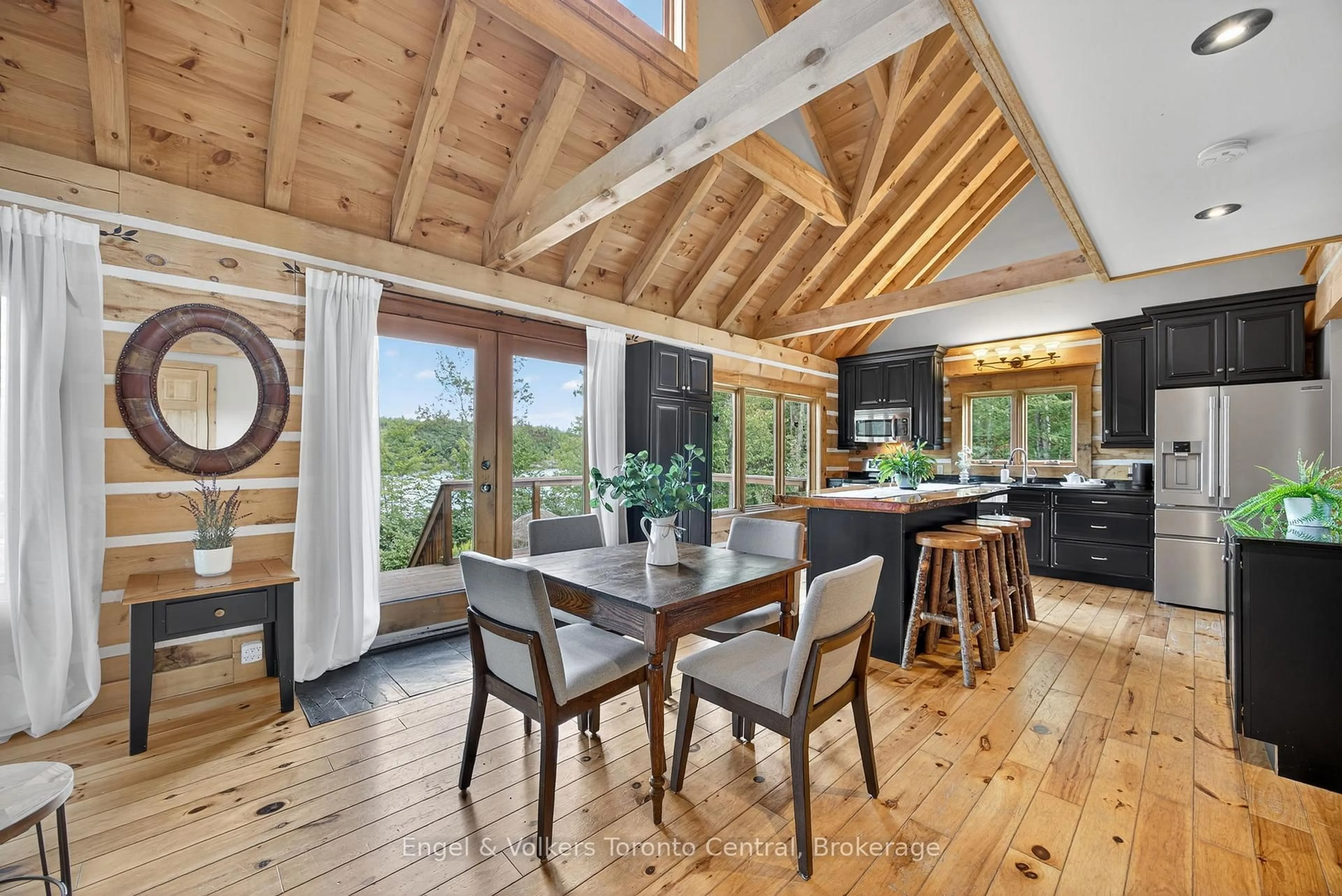 Open concept kitchen, wood/laminate floor for 1042 Amanda Lane, Gravenhurst Ontario P1P 1R3