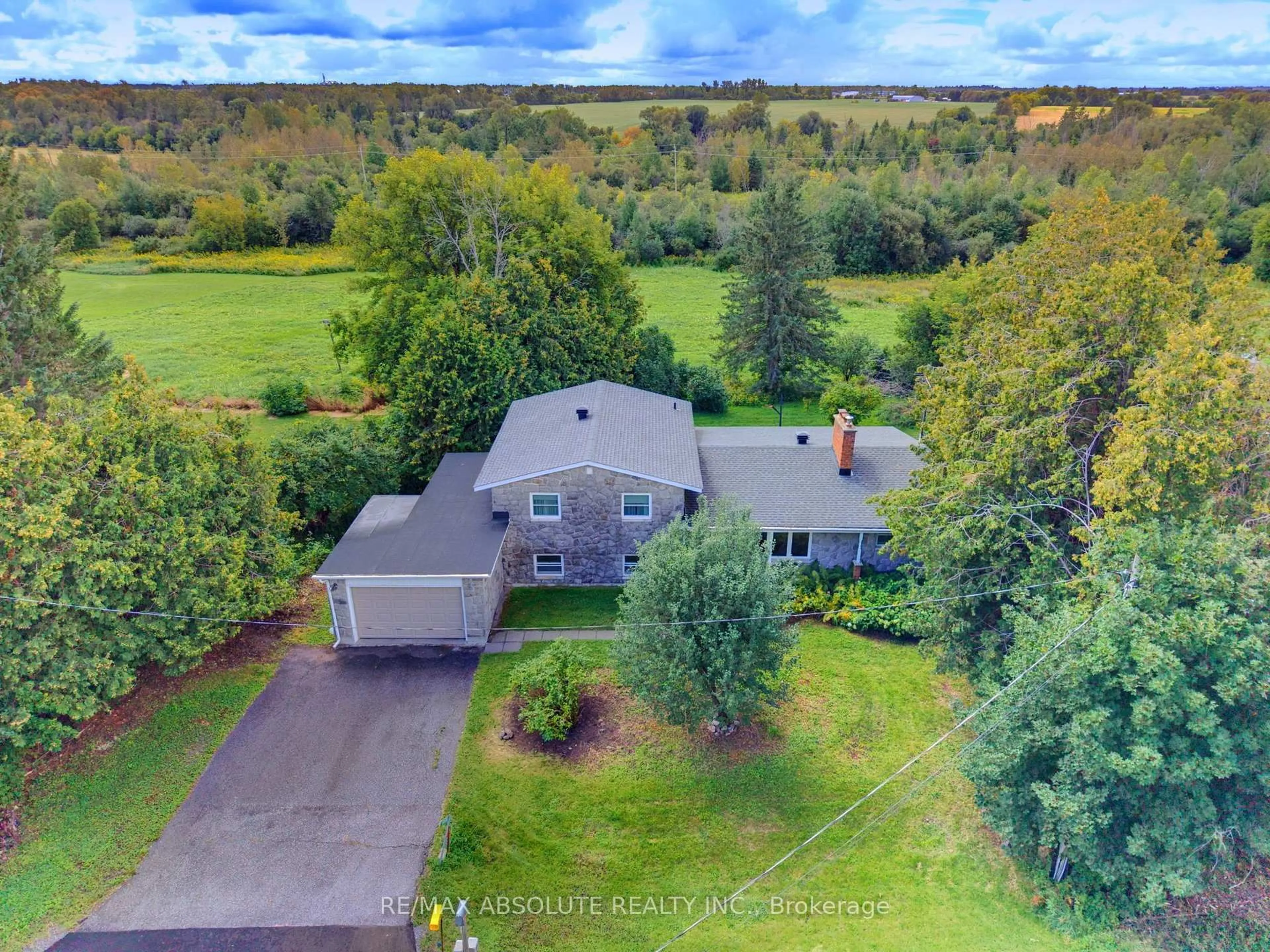 A pic from outside/outdoor area/front of a property/back of a property/a pic from drone, water/lake/river/ocean view for 1996 Old Carp Rd, Carp Ontario K0A 1L0