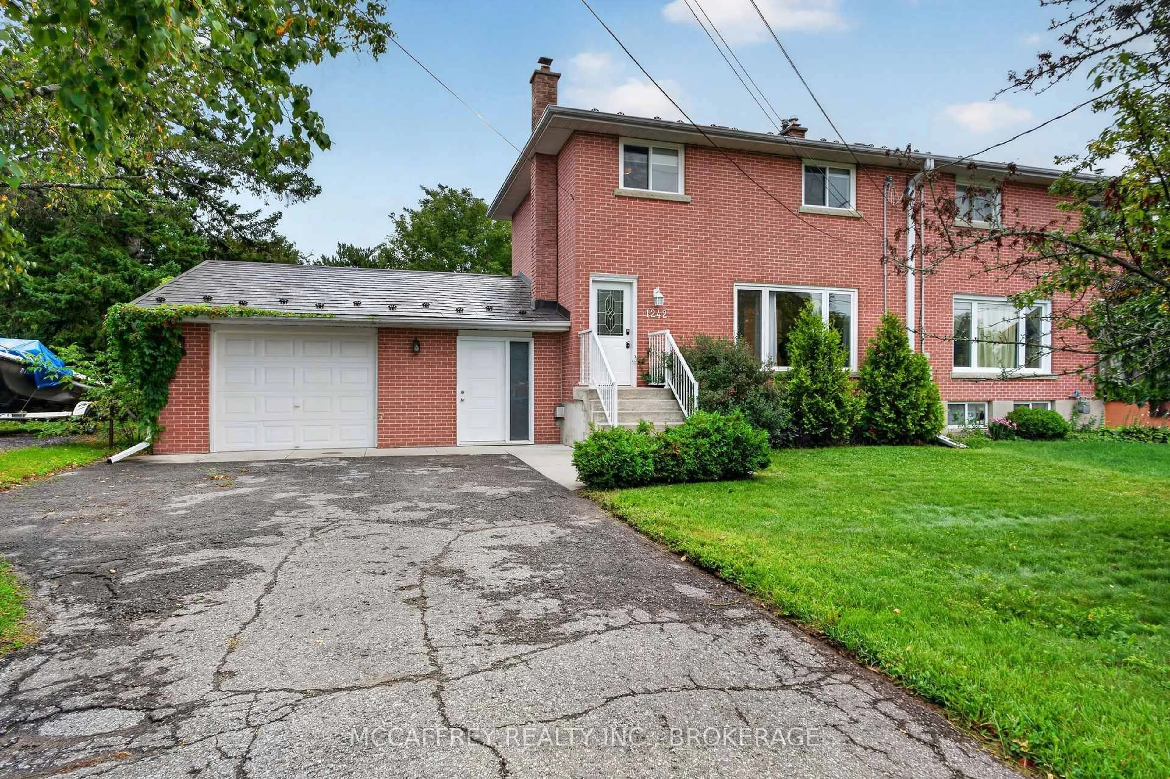 A pic from outside/outdoor area/front of a property/back of a property/a pic from drone, street for 1242 Leyton Ave, Kingston Ontario K7P 2V6