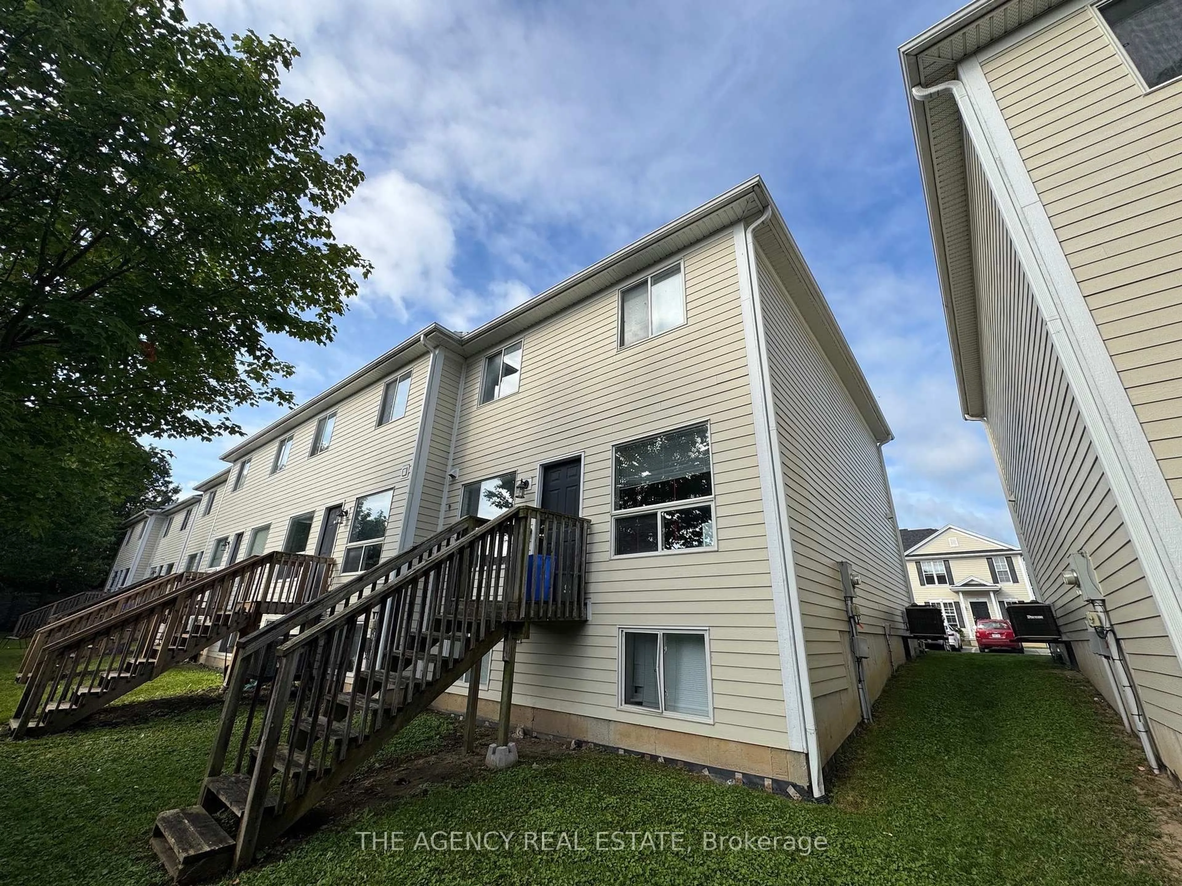 A pic from outside/outdoor area/front of a property/back of a property/a pic from drone, street for 600 Sarnia Rd #23, London North Ontario N6G 5M5