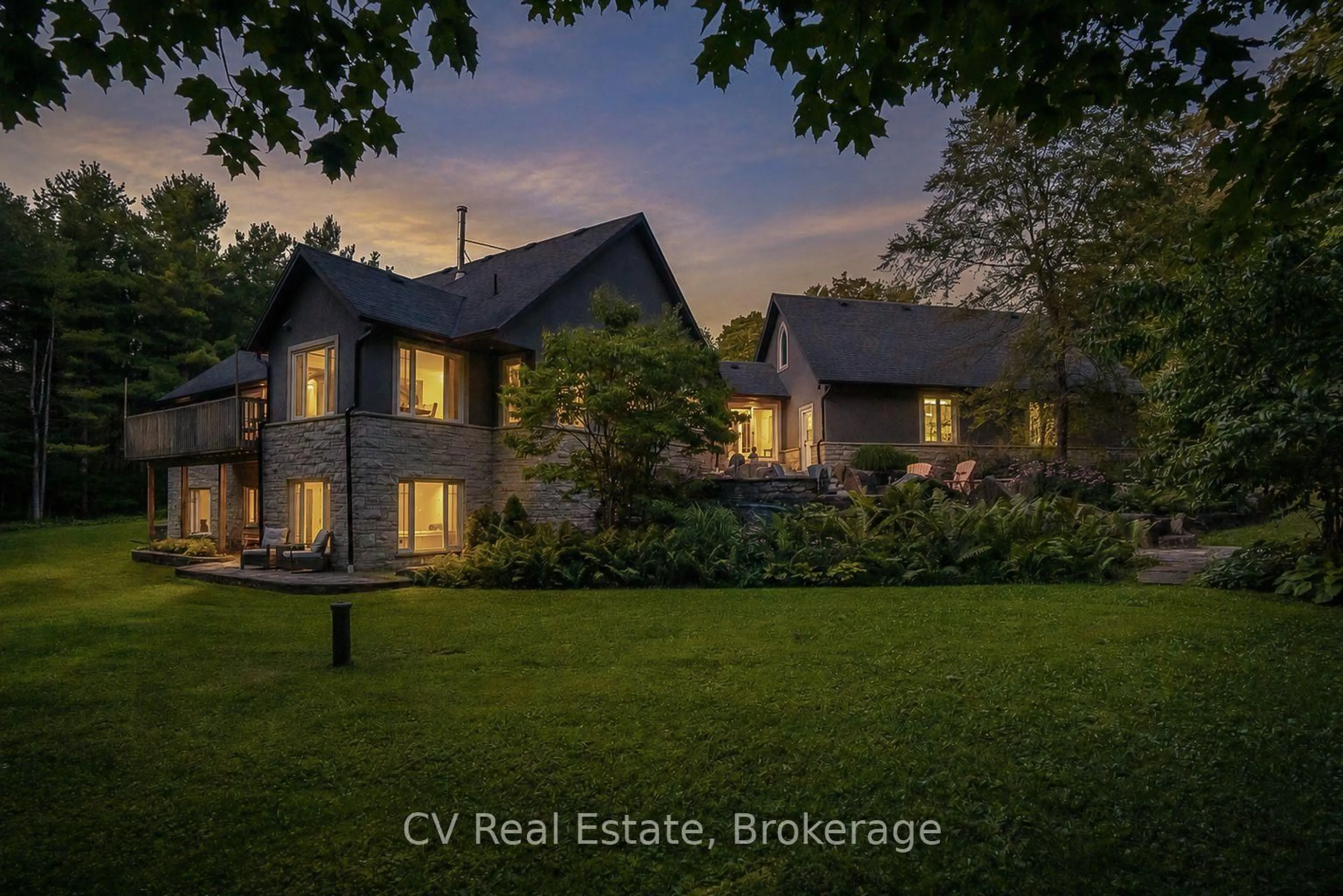 A pic from outside/outdoor area/front of a property/back of a property/a pic from drone, street for 595530 4th Line, Blue Mountains Ontario N0H 2H0
