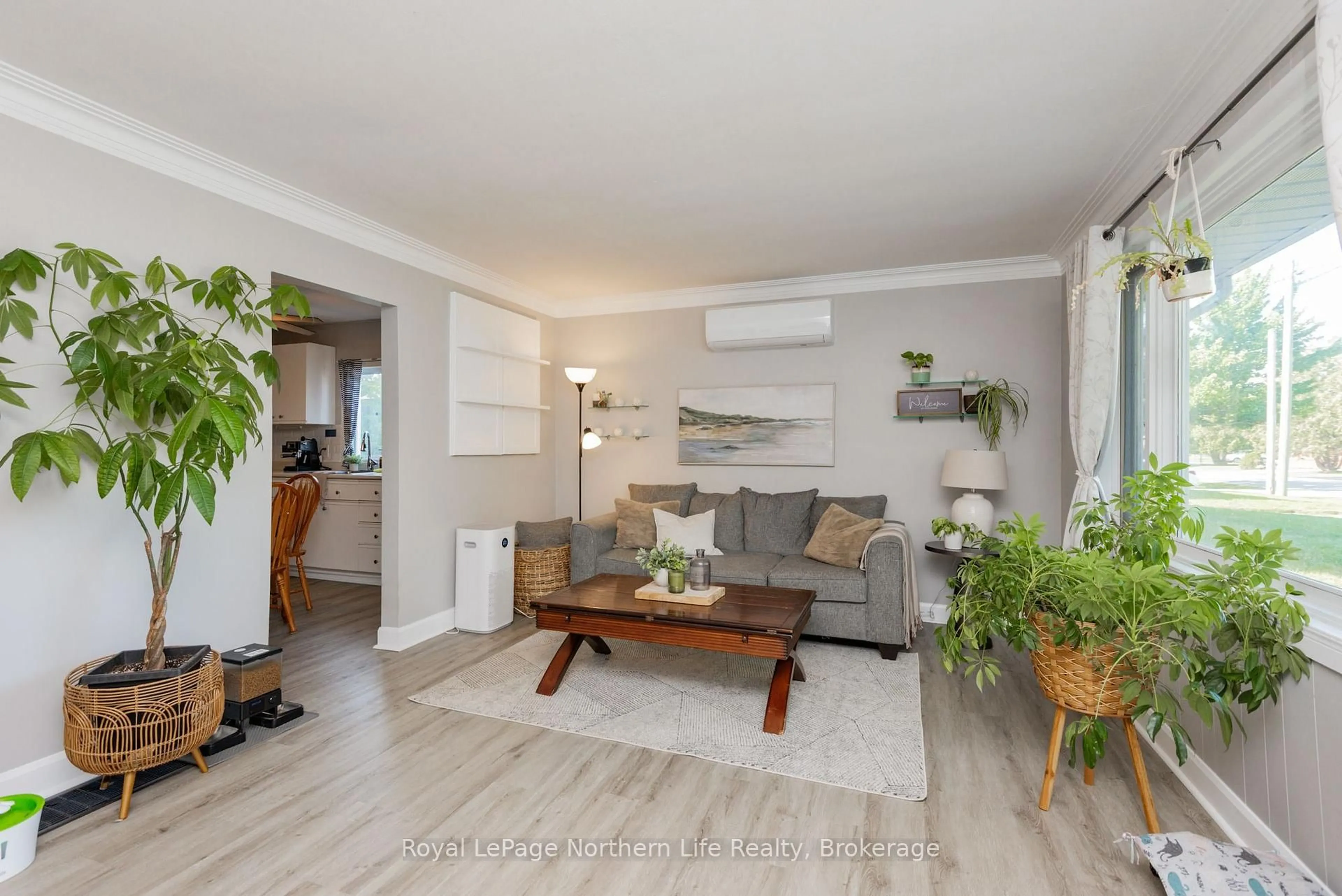 Living room with furniture, wood/laminate floor for 263 Wesley Ave, North Bay Ontario P1A 2K9
