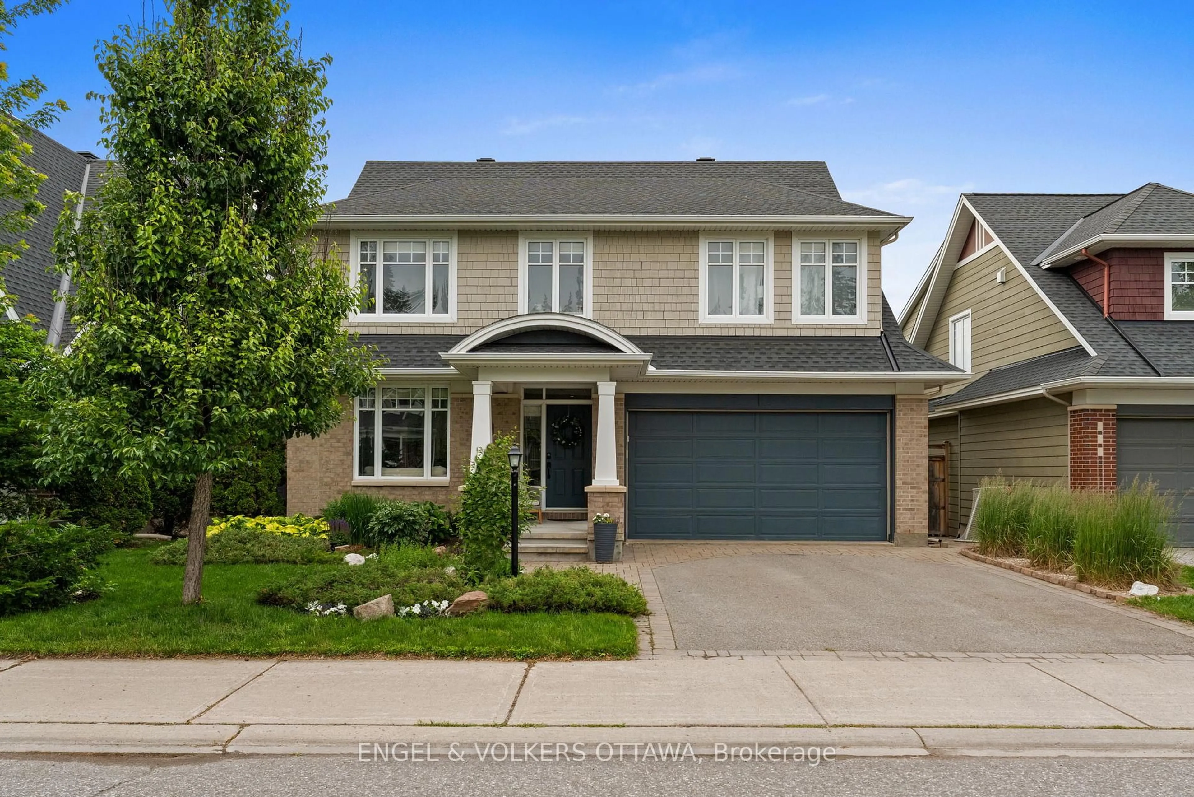 Home with brick exterior material, street for 564 Erinwoods Circ, Ottawa Ontario K2J 5M8