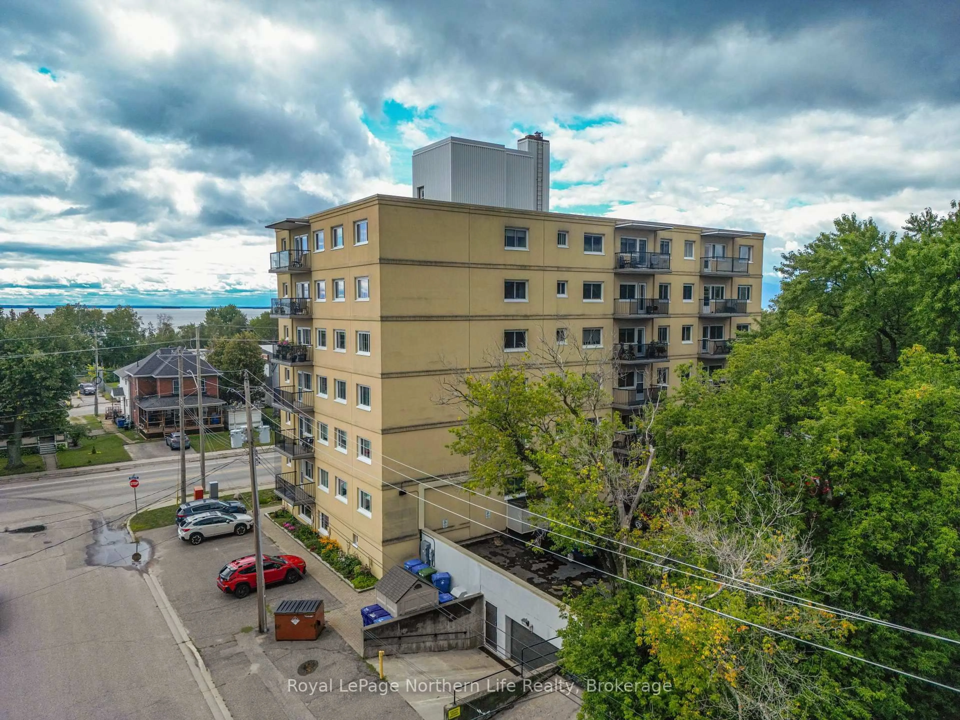A pic from outside/outdoor area/front of a property/back of a property/a pic from drone, city buildings view from balcony for 810 Main St #202, North Bay Ontario P1B 2V9