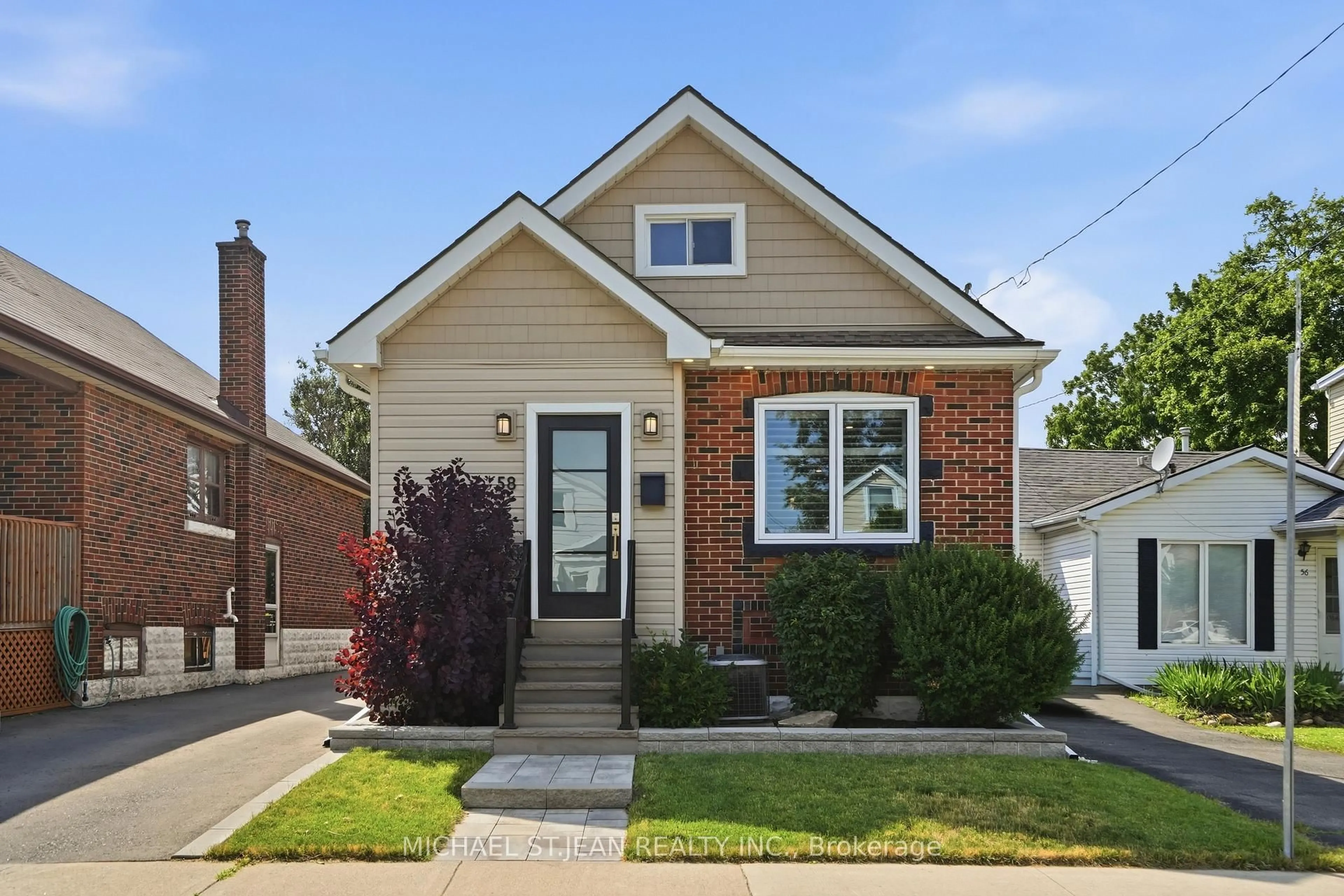 Home with brick exterior material, street for 58 Tragina Ave, Hamilton Ontario L8K 2Z3