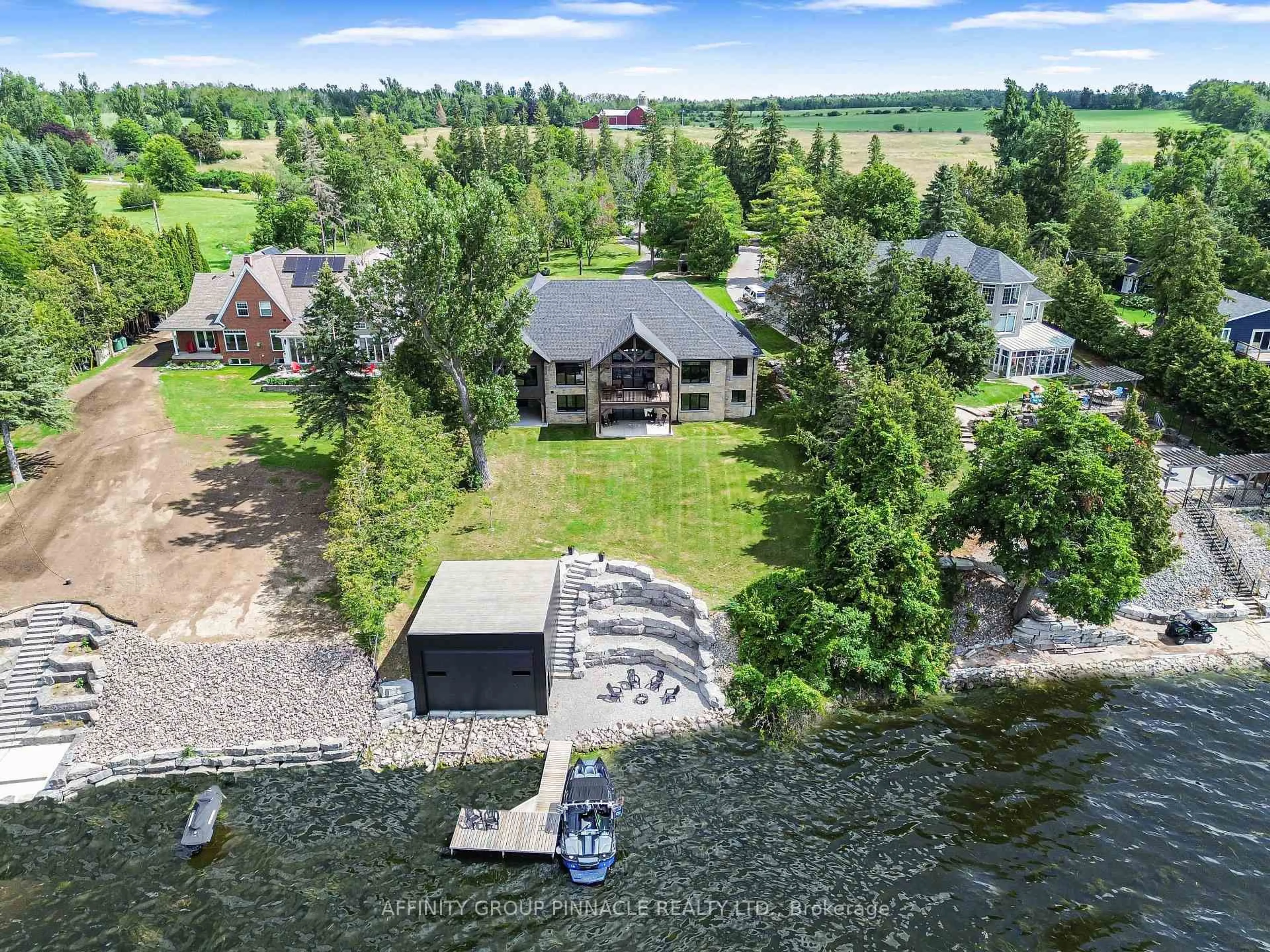 A pic from outside/outdoor area/front of a property/back of a property/a pic from drone, water/lake/river/ocean view for 383 Snug Harbour Rd, Kawartha Lakes Ontario K9V 4R6