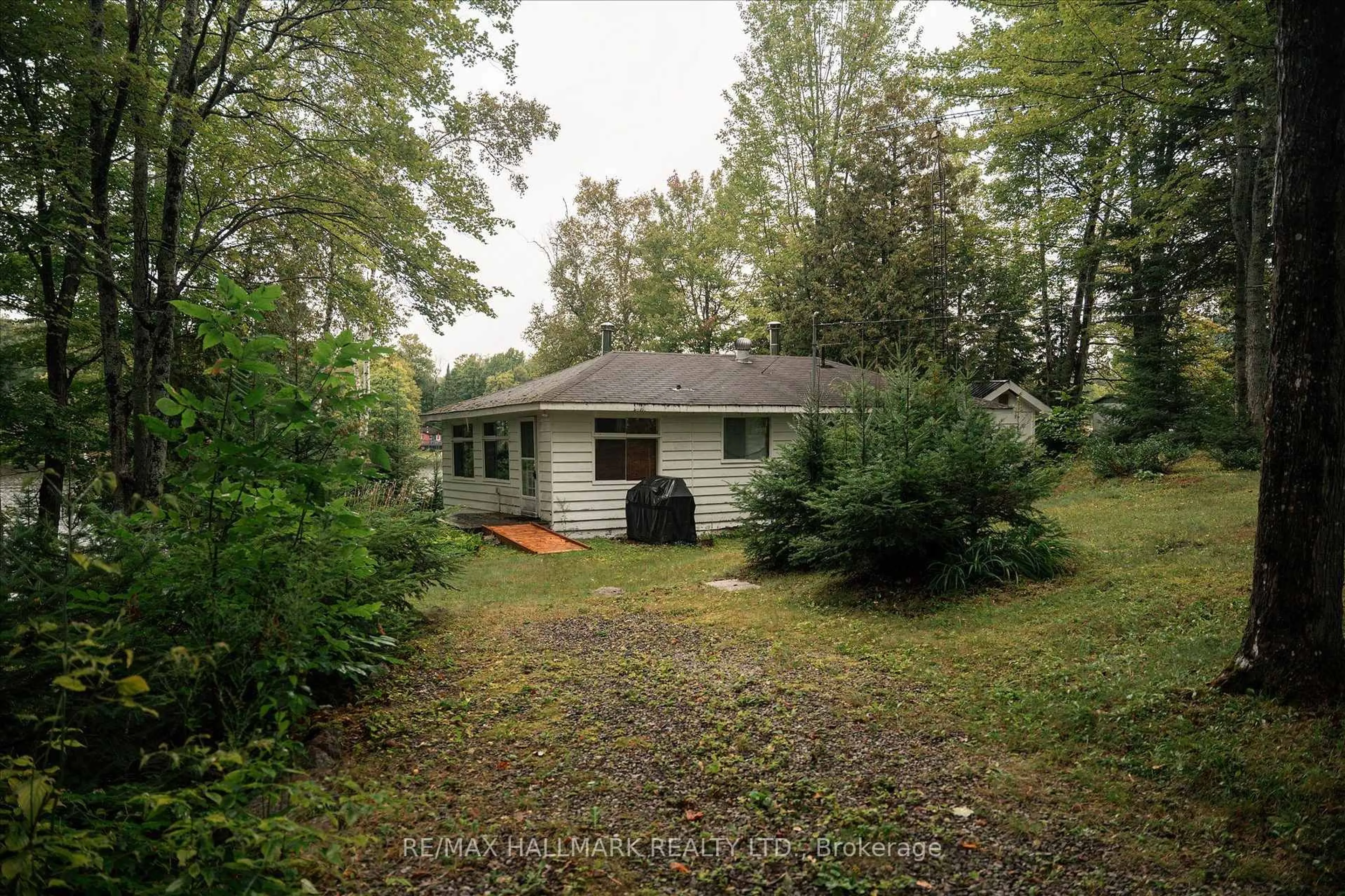 A pic from outside/outdoor area/front of a property/back of a property/a pic from drone, forest/trees view for 1124 Comfort Dr, Highlands East Ontario K0M 1R0