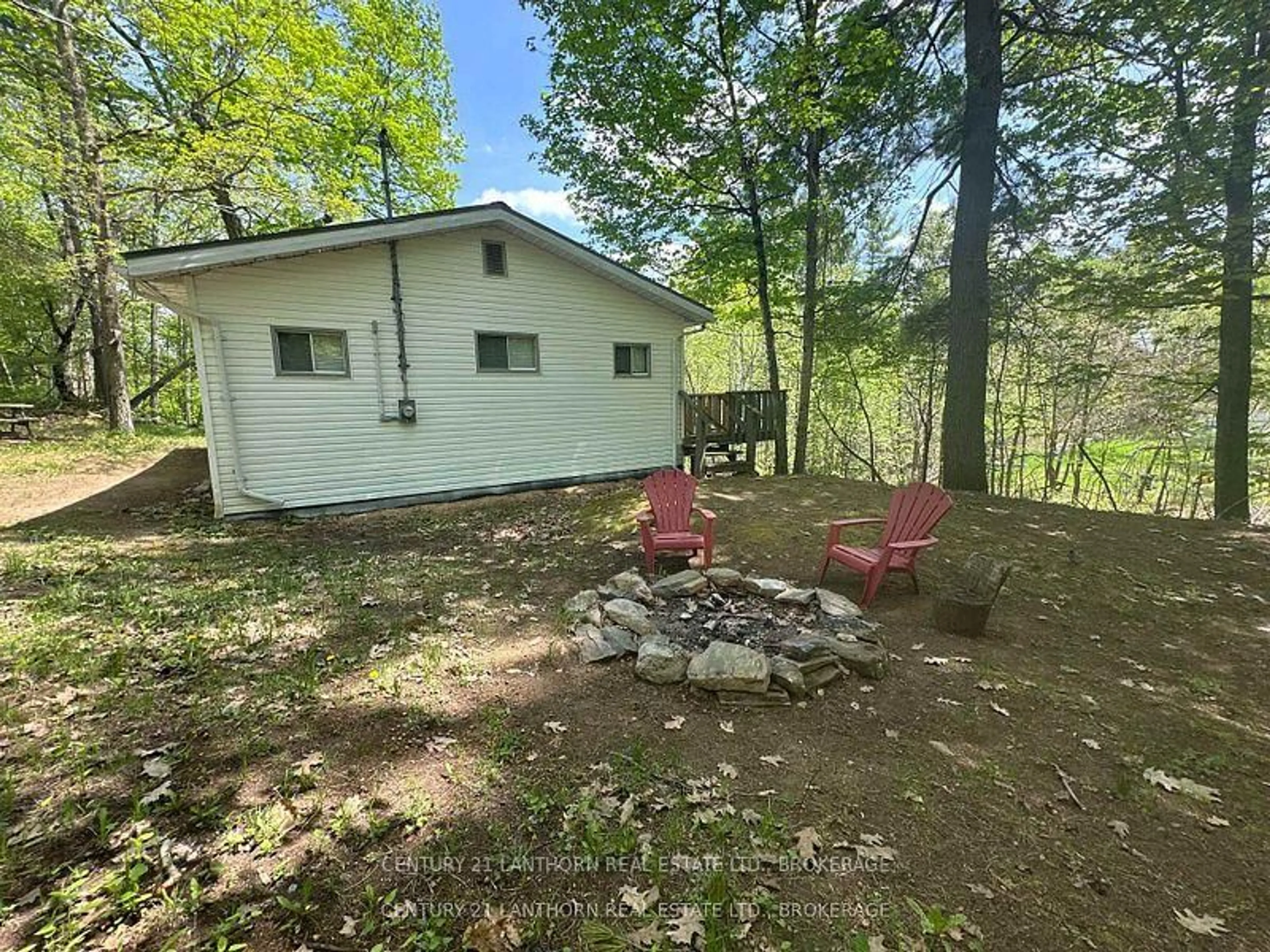 A pic from outside/outdoor area/front of a property/back of a property/a pic from drone, forest/trees view for 1024 Harrington Lane, Frontenac Ontario K0H 0B6