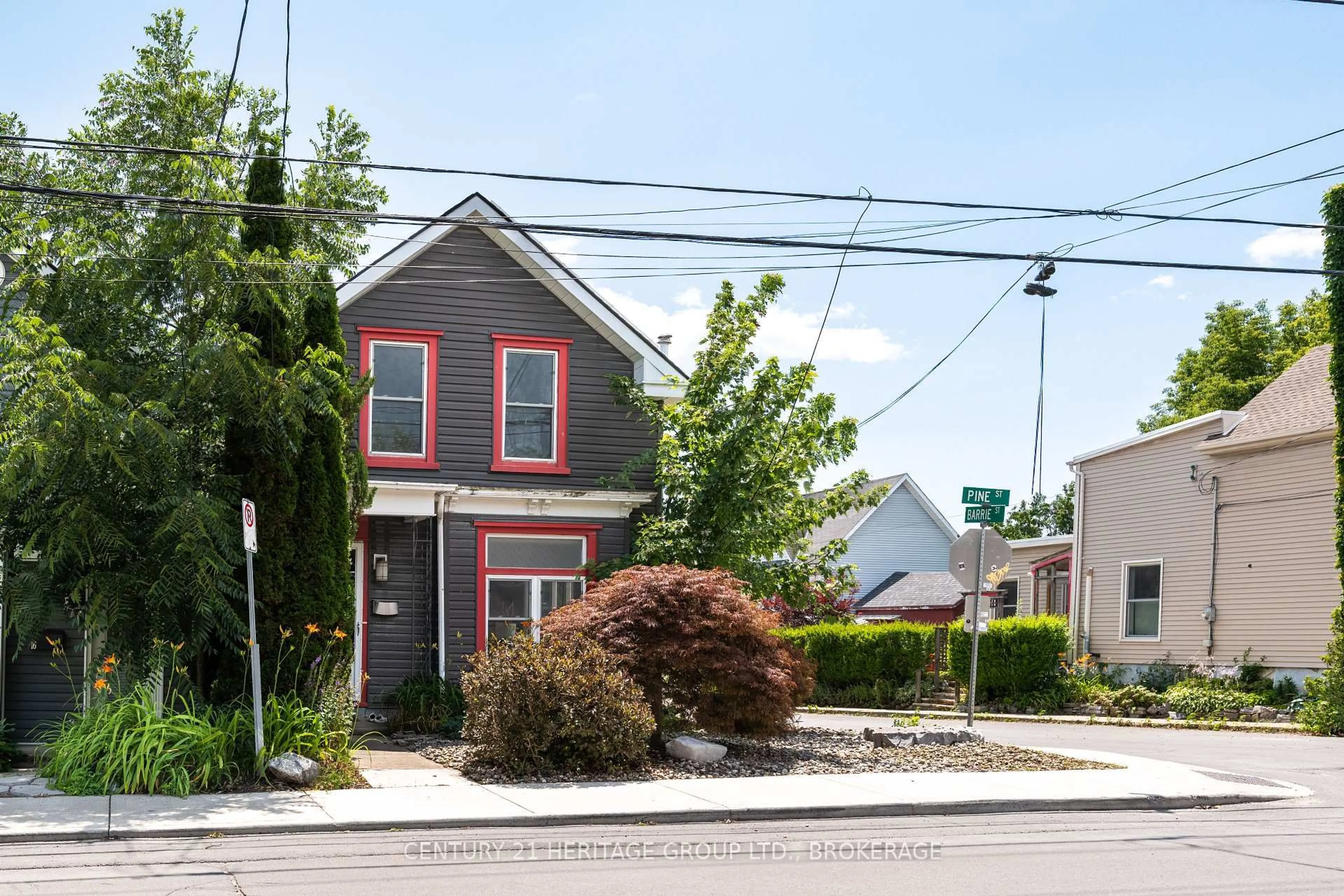 Home with vinyl exterior material, street for 18 Pine St, Kingston Ontario K7K 1W1