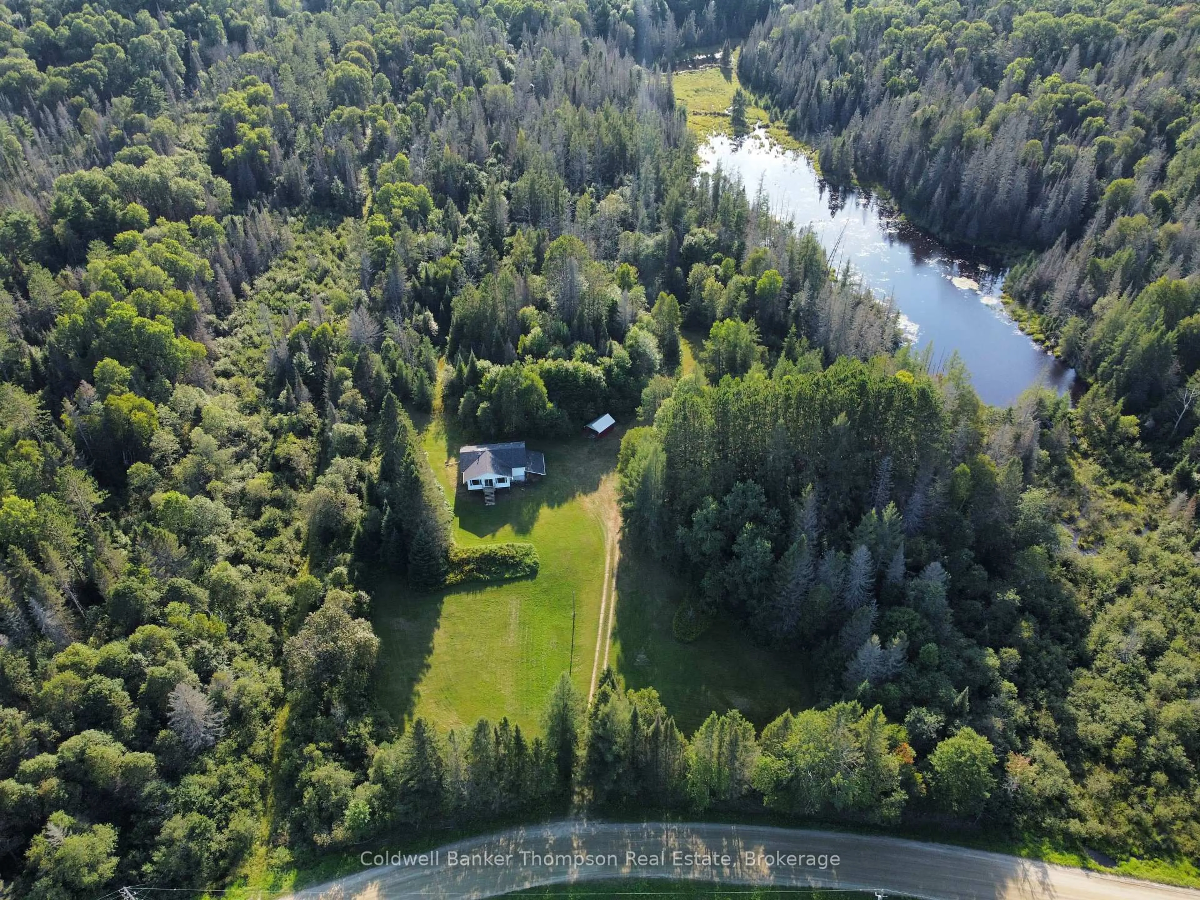 A pic from outside/outdoor area/front of a property/back of a property/a pic from drone, water/lake/river/ocean view for 458 Leighton Rd, Machar Ontario P0A 1X0