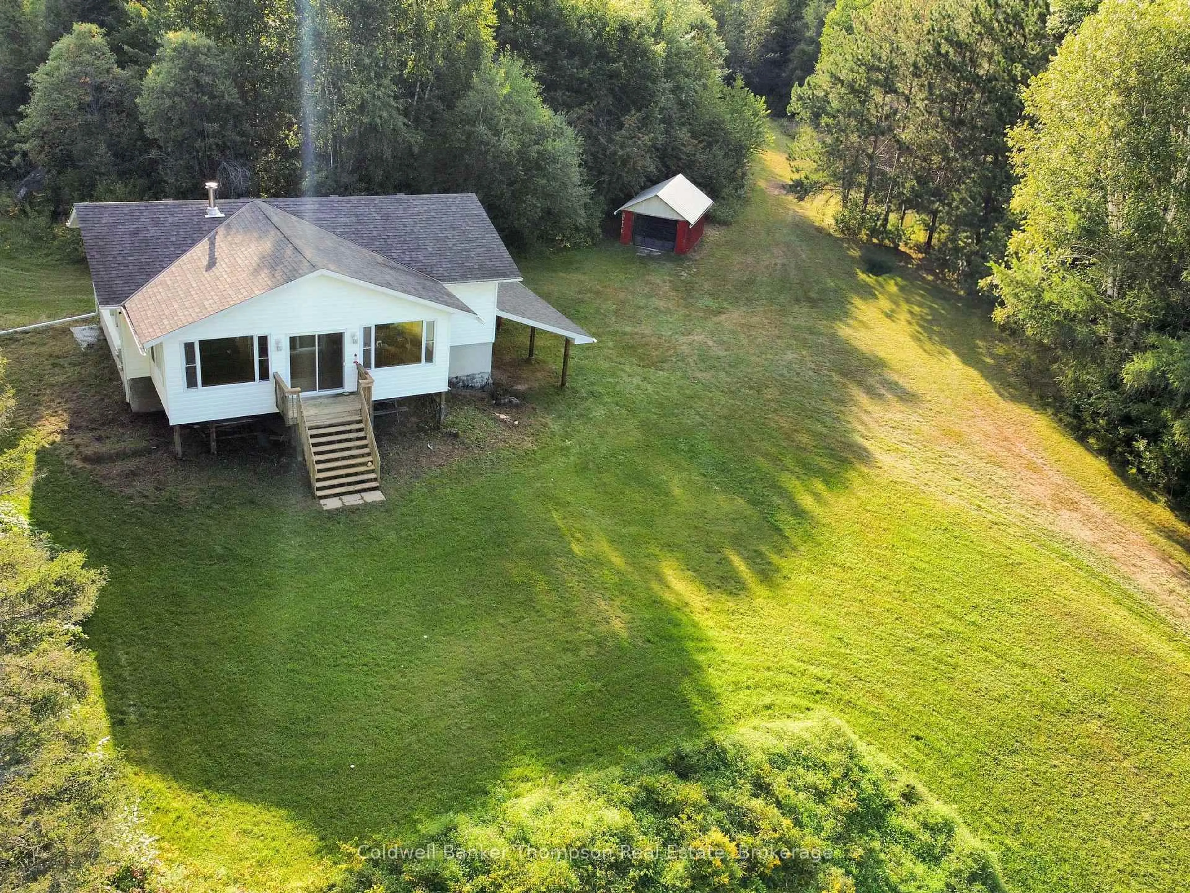 A pic from outside/outdoor area/front of a property/back of a property/a pic from drone, unknown for 458 Leighton Rd, Machar Ontario P0A 1X0