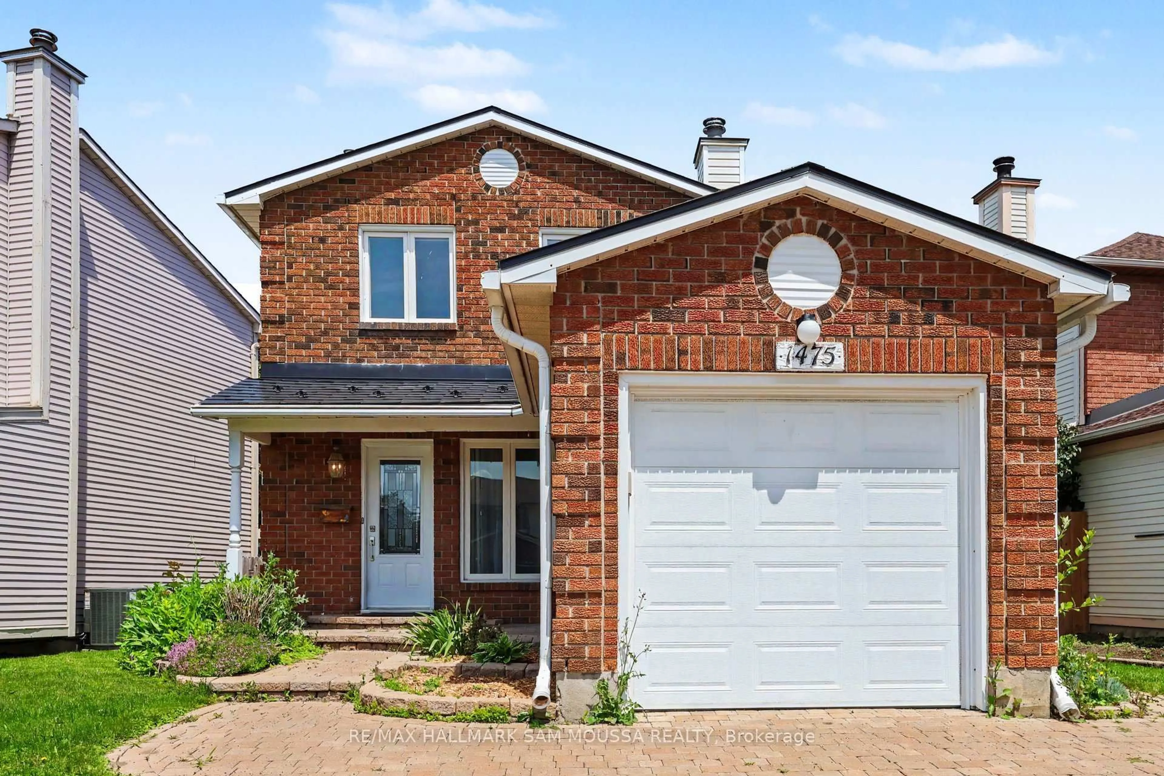 Home with brick exterior material, street for 1475 Deavy Way, Ottawa Ontario K1E 2W7