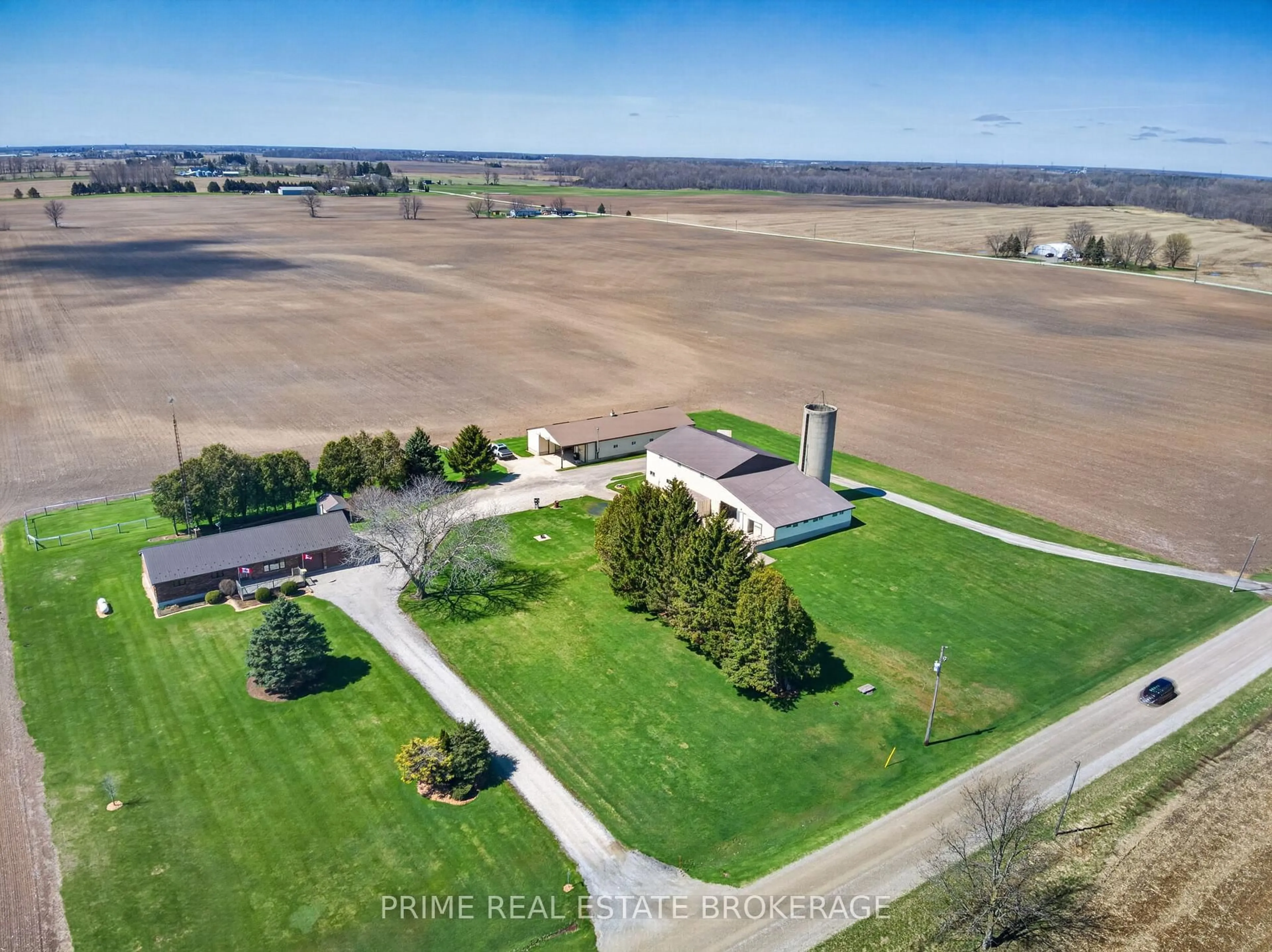 A pic from outside/outdoor area/front of a property/back of a property/a pic from drone, unknown for 22403 Springfield Rd, Southwest Middlesex Ontario N0L 1T0