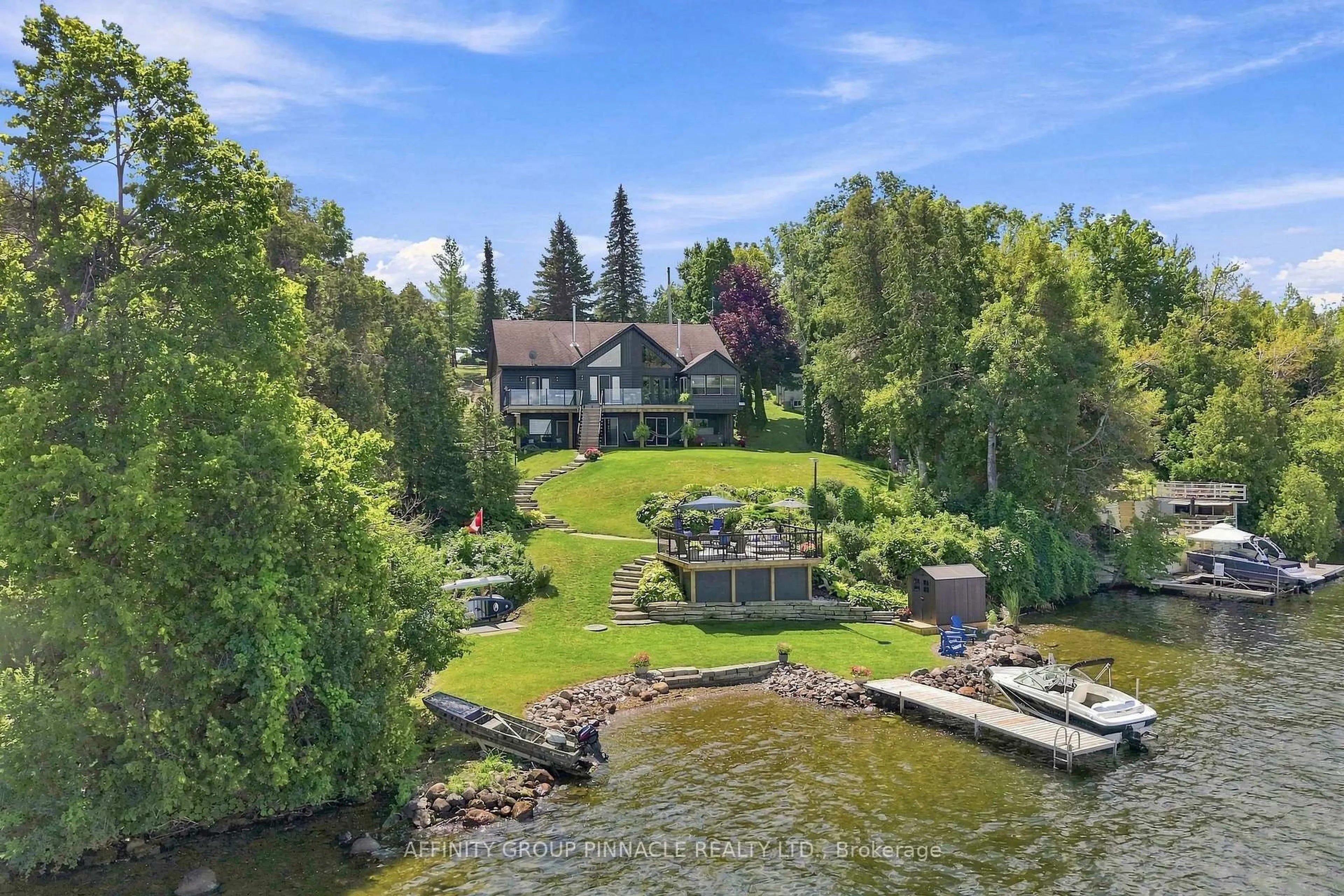 A pic from outside/outdoor area/front of a property/back of a property/a pic from drone, water/lake/river/ocean view for 2 Major St, Kawartha Lakes Ontario K0M 1L0