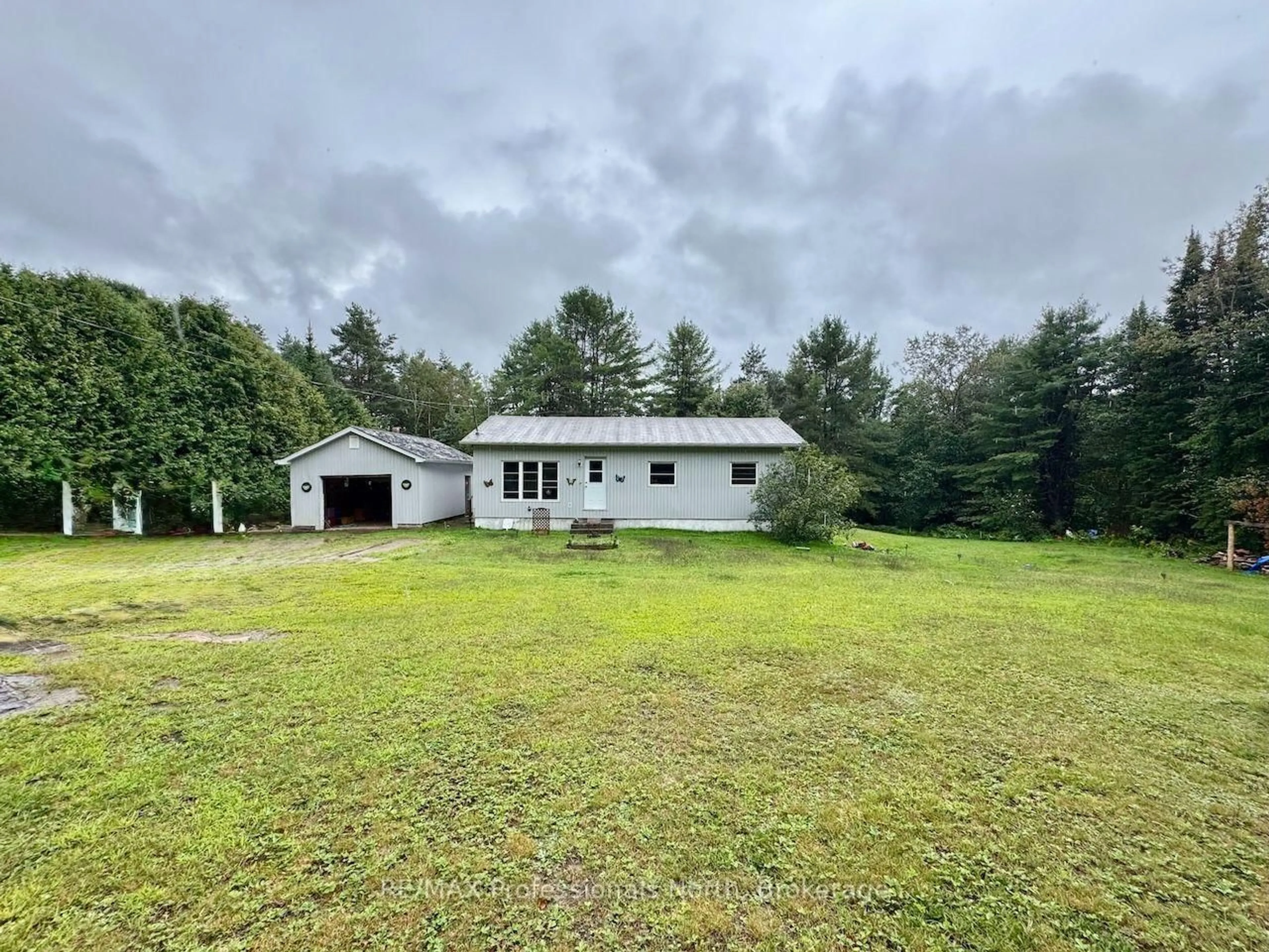 A pic from outside/outdoor area/front of a property/back of a property/a pic from drone, building for 2584 Contau Lake Rd, Highlands East Ontario K0M 1R0