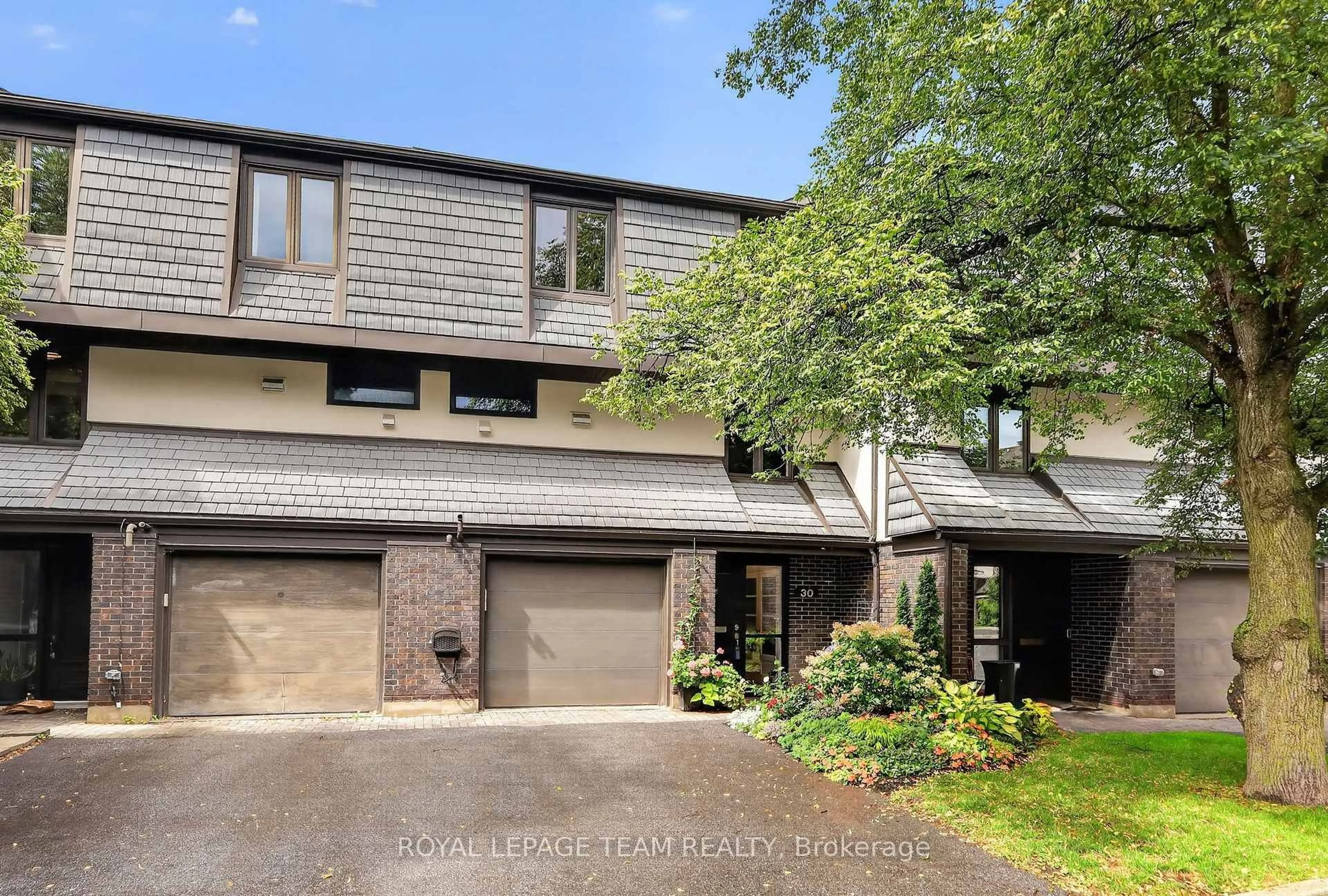 Home with brick exterior material, street for 655 Richmond Rd #30, Ottawa Ontario K2A 3Y3