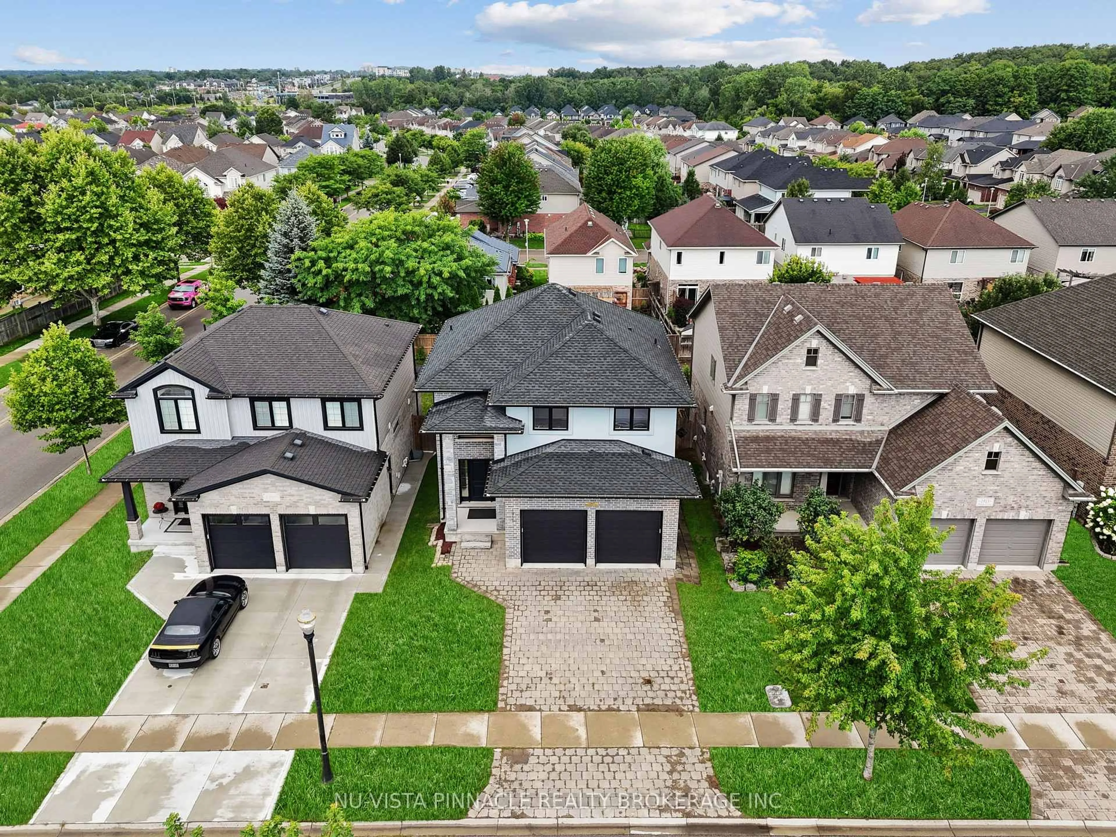 A pic from outside/outdoor area/front of a property/back of a property/a pic from drone, street for 1911 Ballymote Ave, London North Ontario N5X 0J5