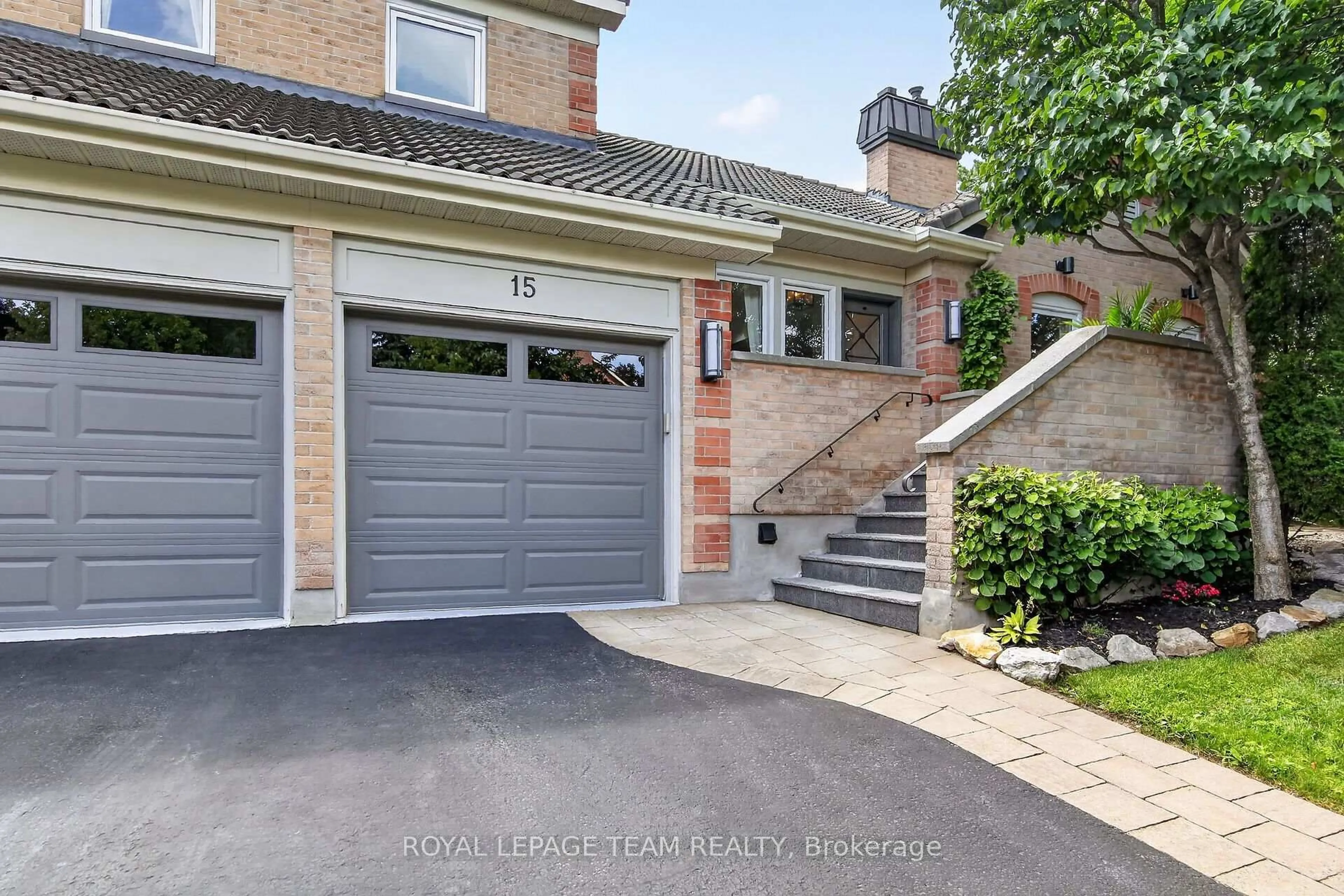Home with brick exterior material, street for 15 Kintail Crt, Stittsville Ontario K2S 1G8