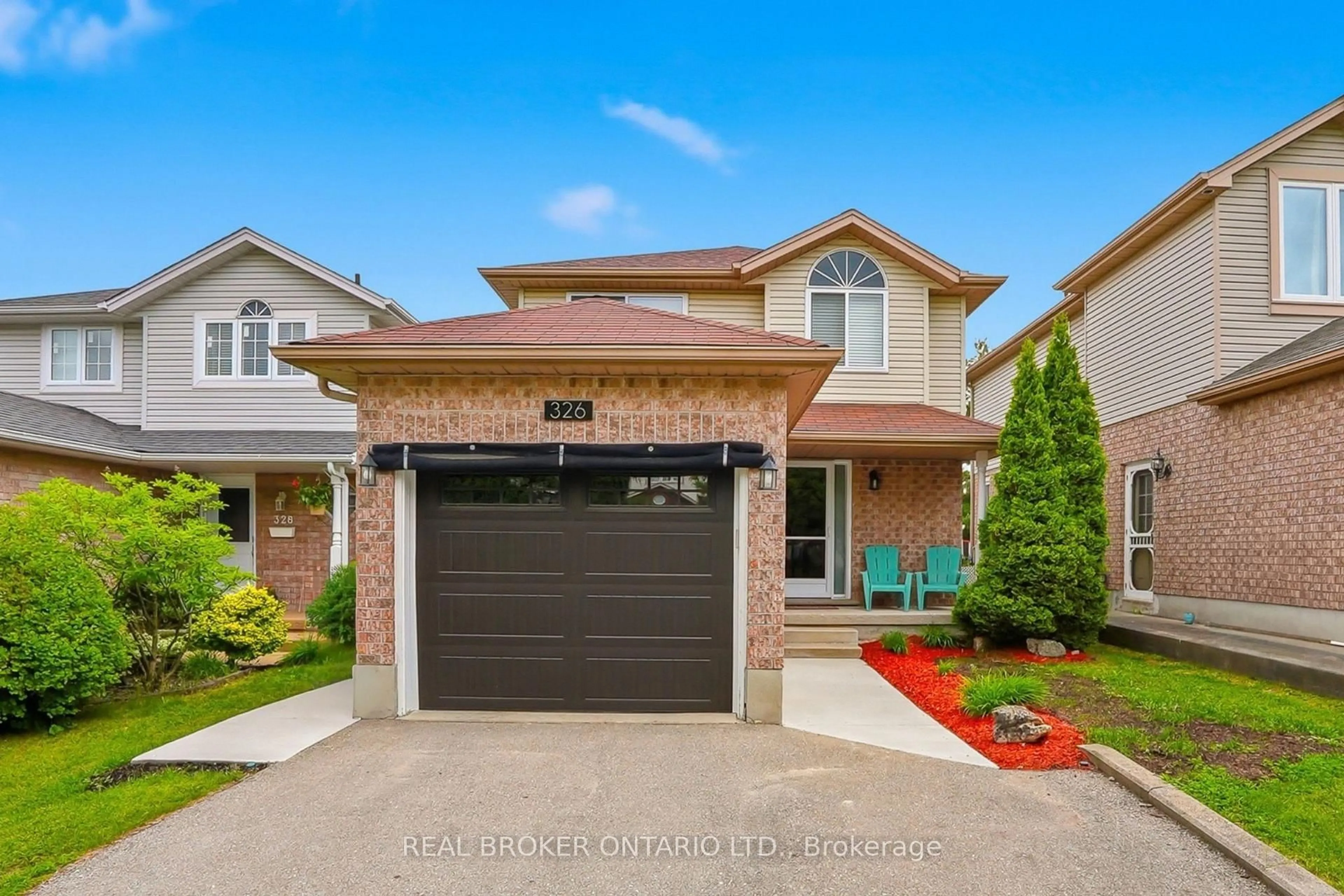Home with brick exterior material, street for 326 Rosette Dr, Waterloo Ontario N2K 3W7