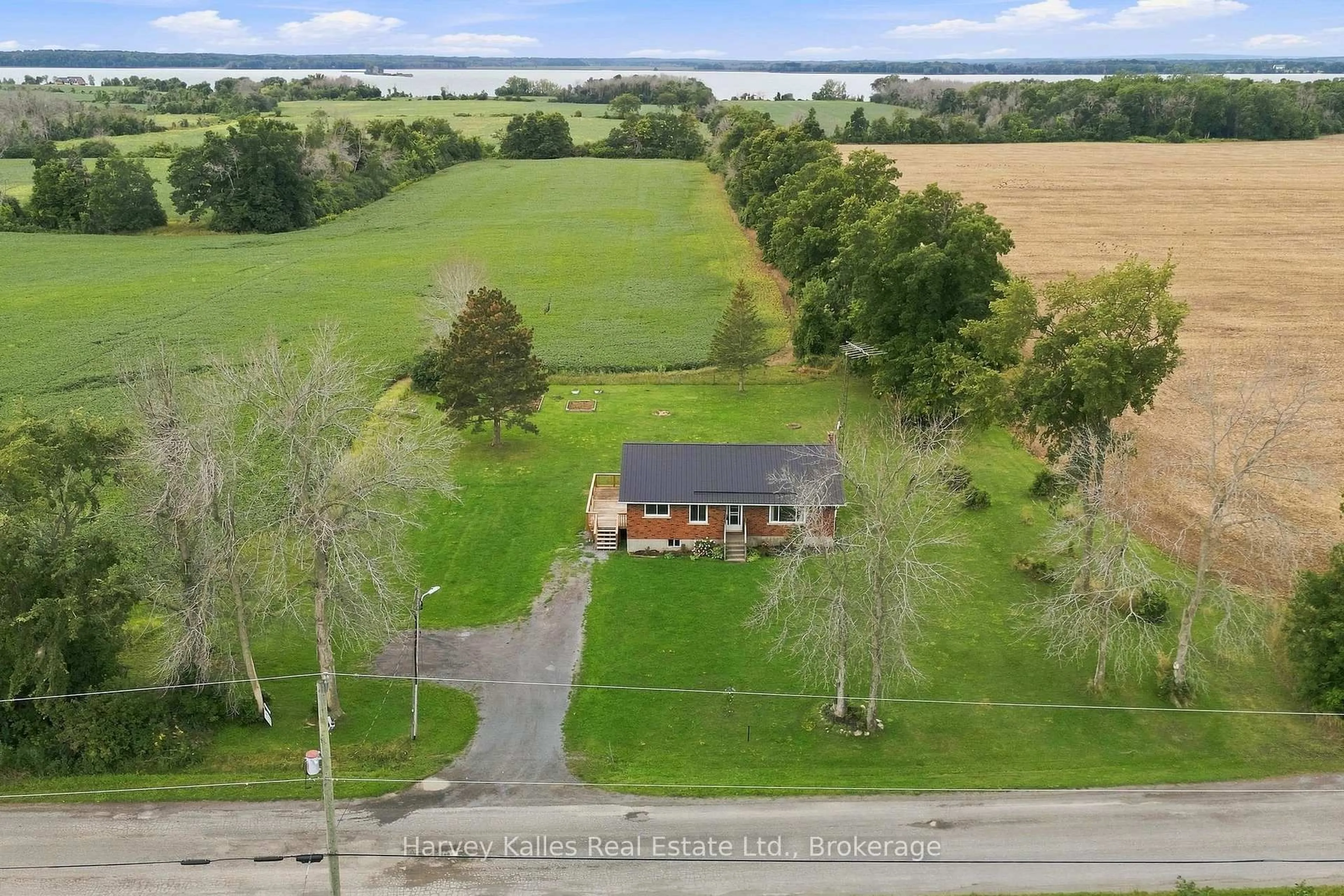A pic from outside/outdoor area/front of a property/back of a property/a pic from drone, water/lake/river/ocean view for 147 Caughey Rd, Prince Edward County Ontario K0K 1W0