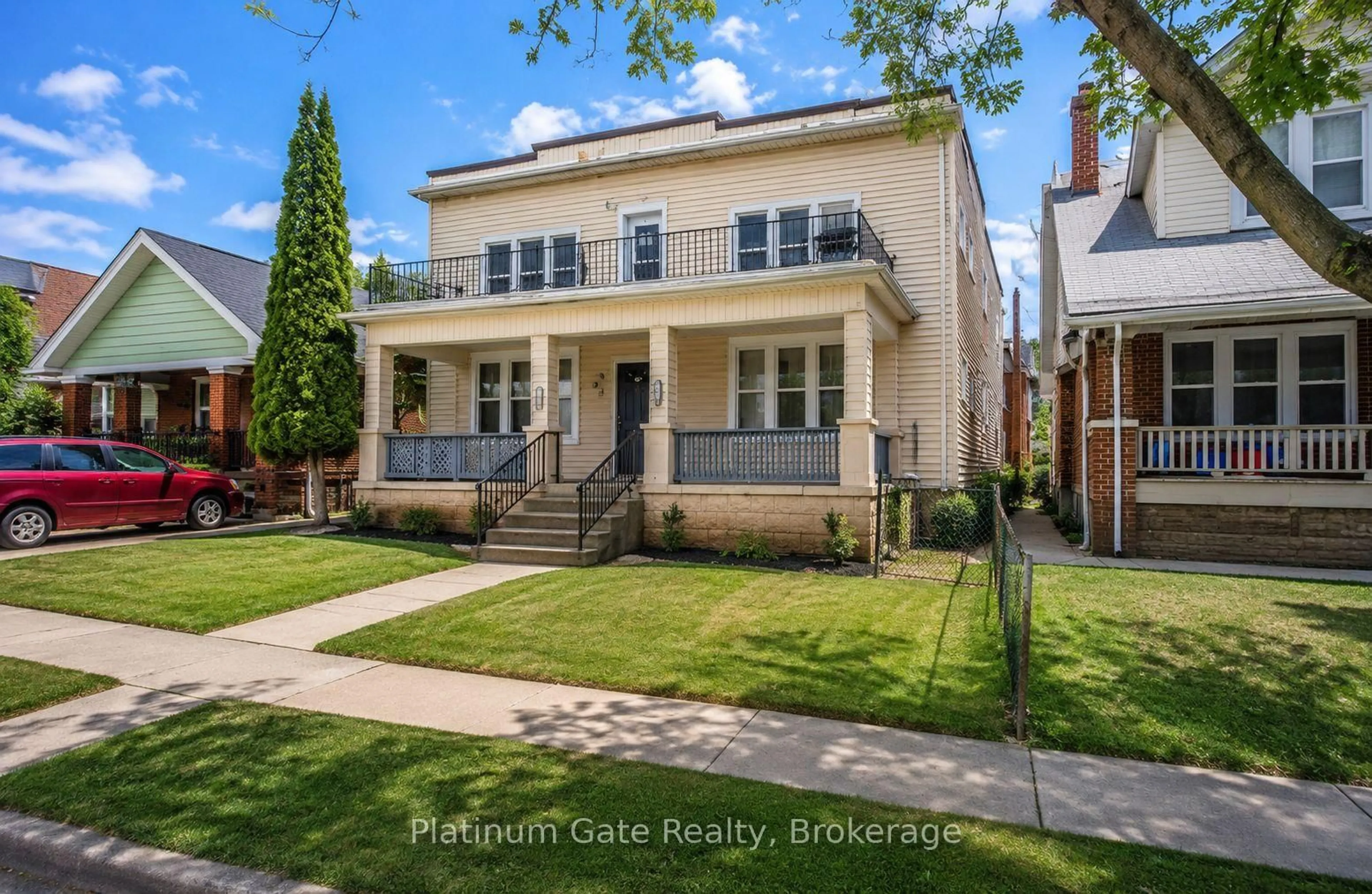 Home with brick exterior material, street for 1543-45 Church St, Windsor Ontario N8N 1V4