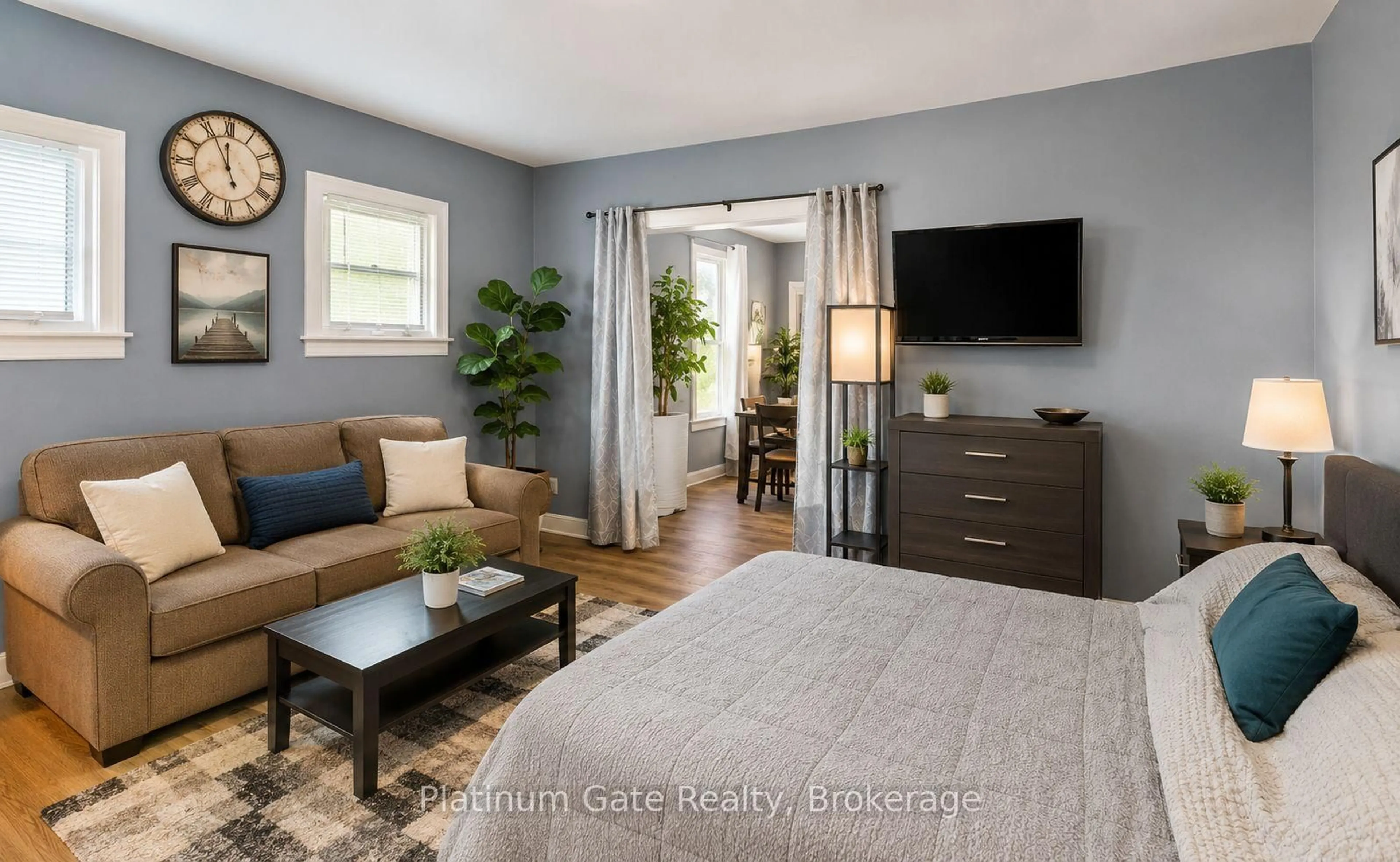 Living room with furniture, wood/laminate floor for 1543-45 Church St, Windsor Ontario N8N 1V4