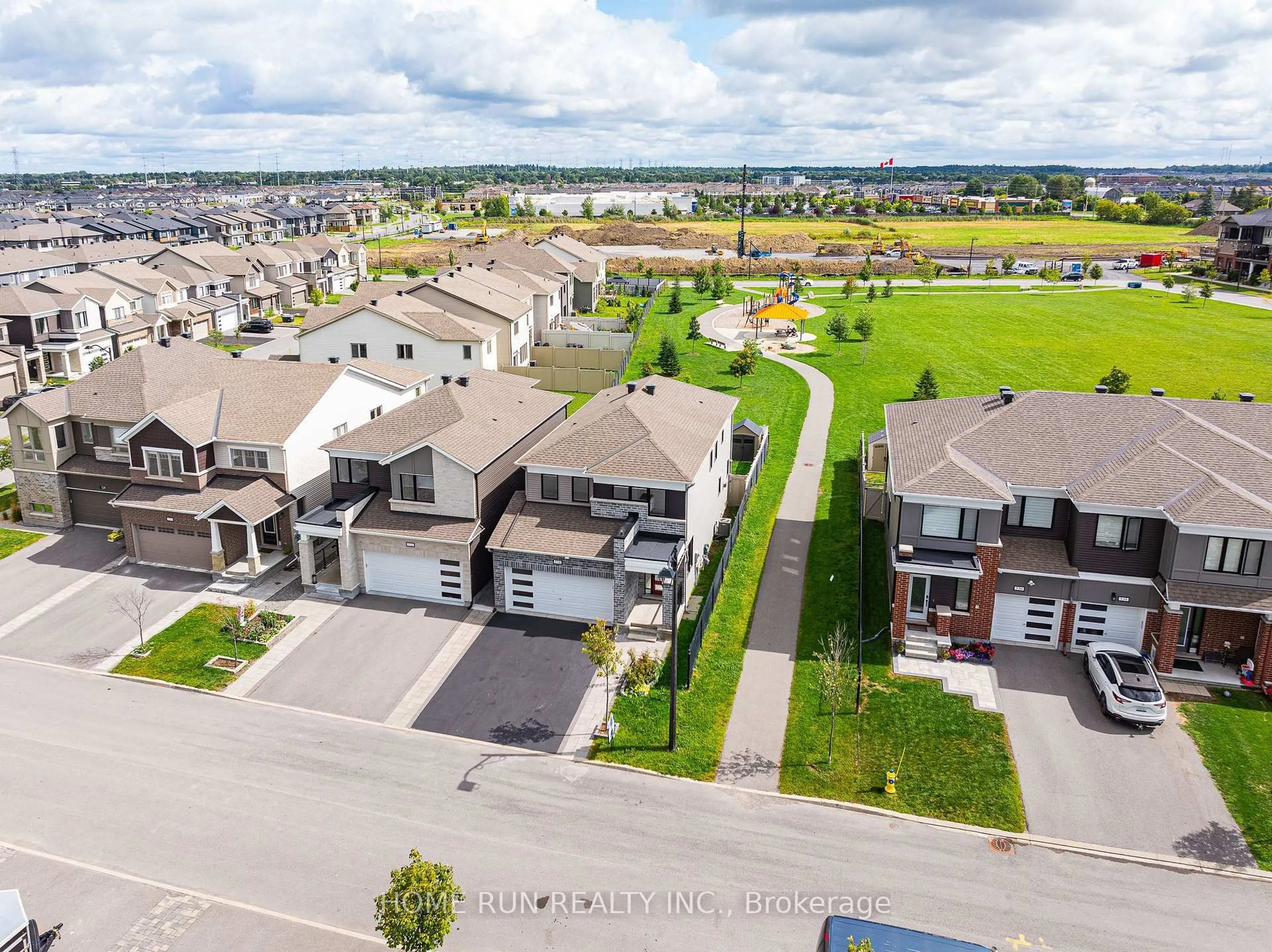 A pic from outside/outdoor area/front of a property/back of a property/a pic from drone, unknown for 534 Arosa Way, Ottawa Ontario K2V 0R8