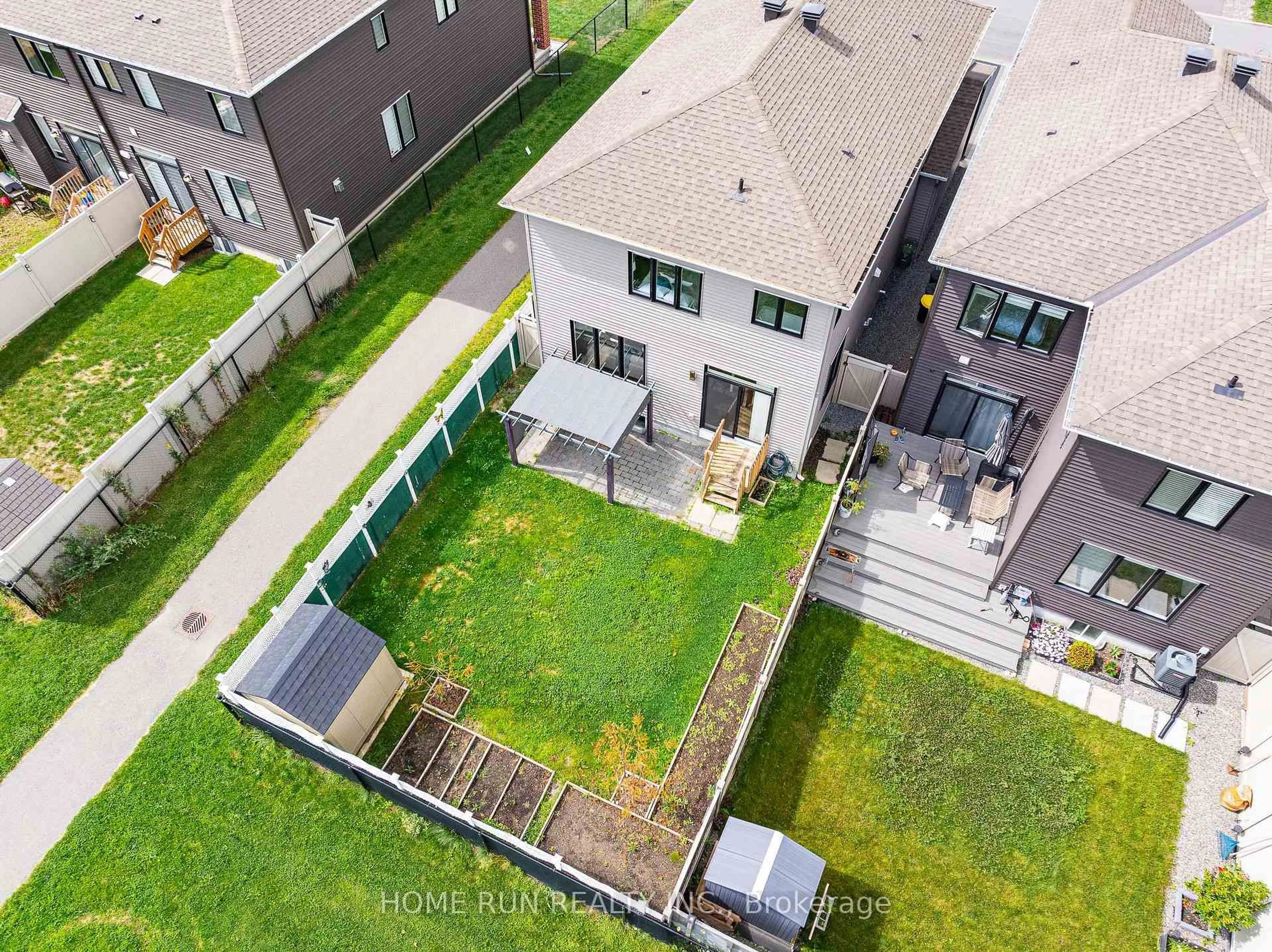 A pic from outside/outdoor area/front of a property/back of a property/a pic from drone, unknown for 534 Arosa Way, Ottawa Ontario K2V 0R8