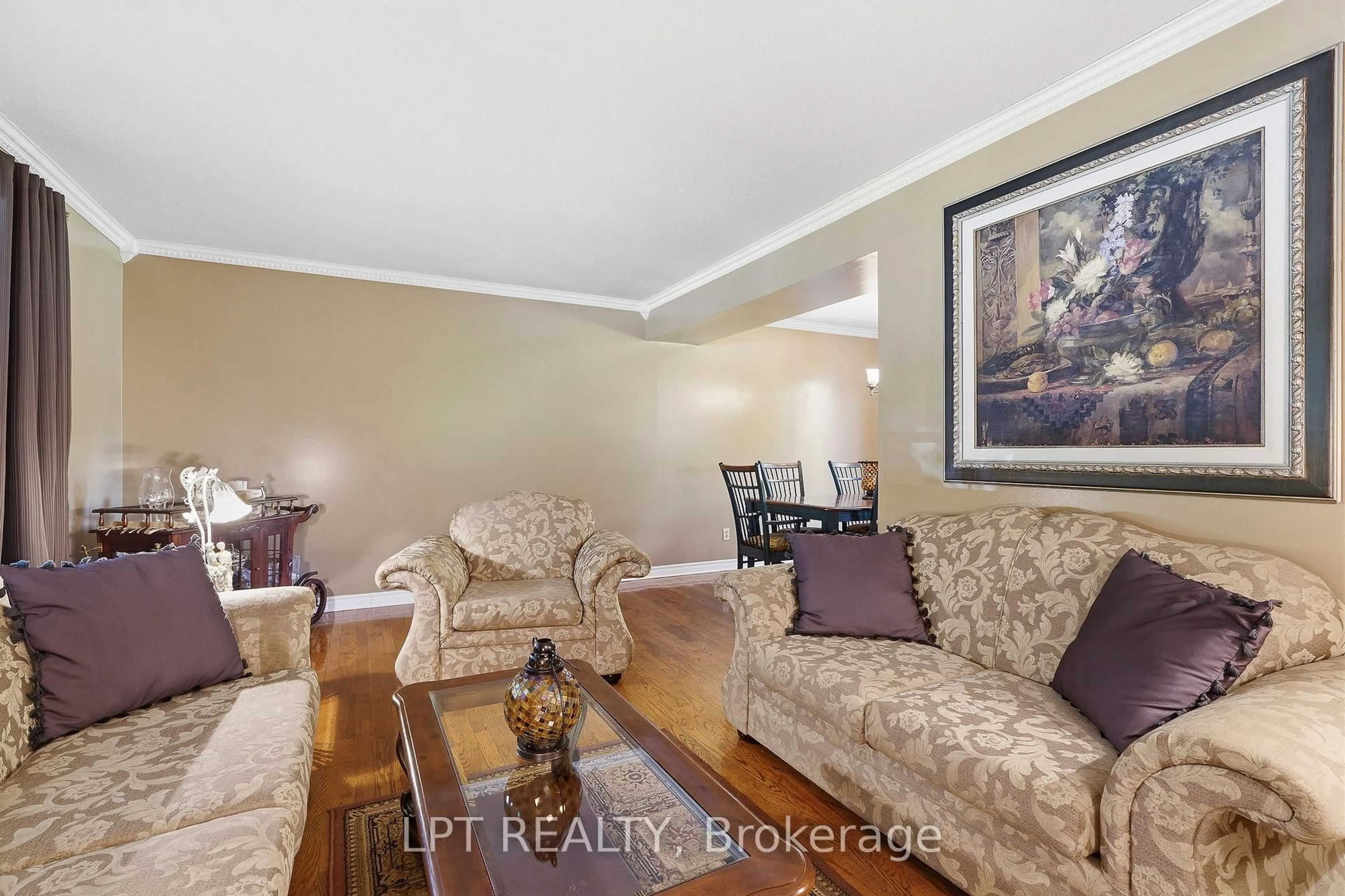 Living room with furniture, wood/laminate floor for 18 Louise Cres, Russell Ontario K0A 1W0