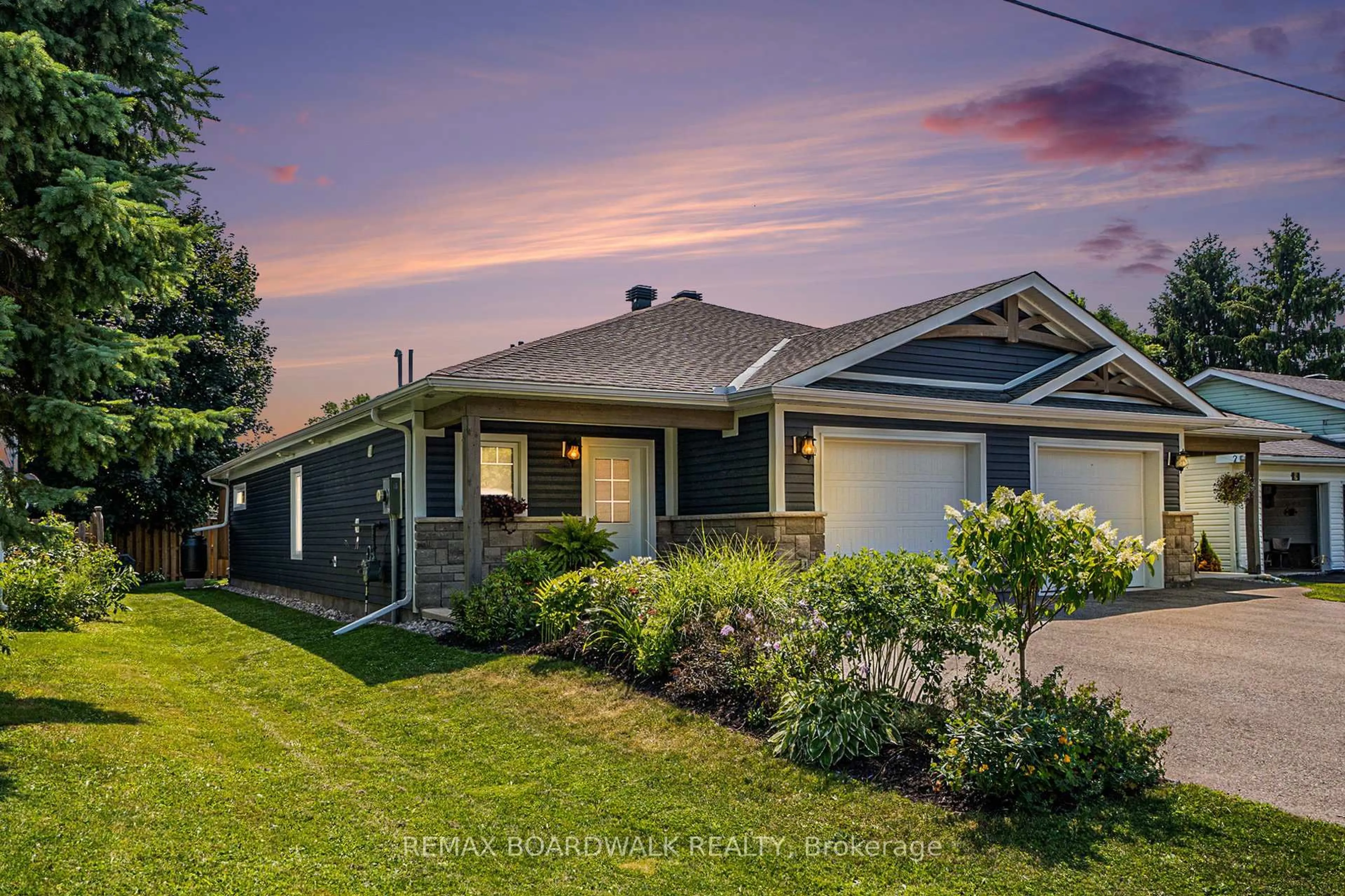 Home with vinyl exterior material, street for 7A Hoy St, Edwardsburgh/Cardinal Ontario K0E 1E0