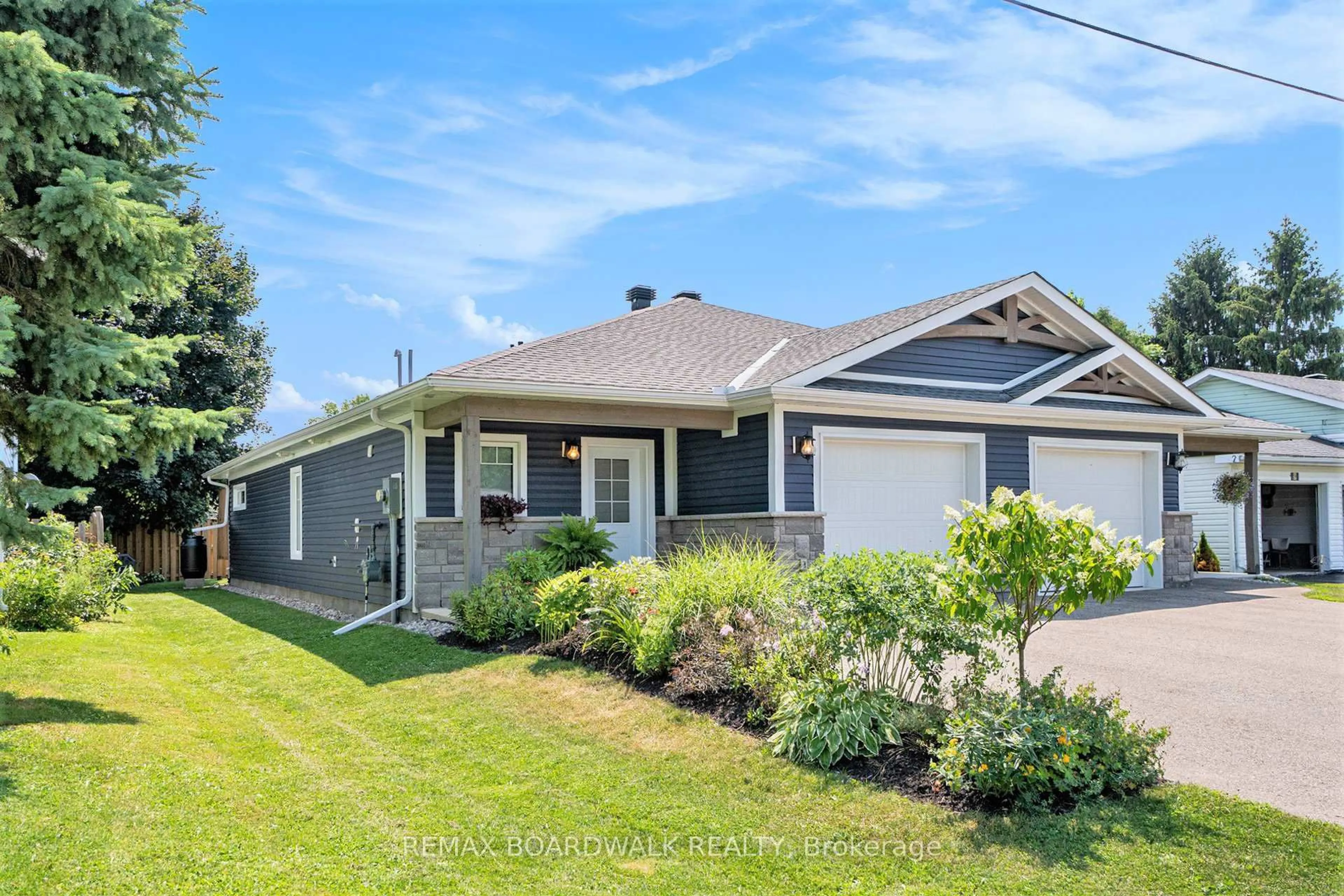 Home with vinyl exterior material, street for 7A Hoy St, Edwardsburgh/Cardinal Ontario K0E 1E0