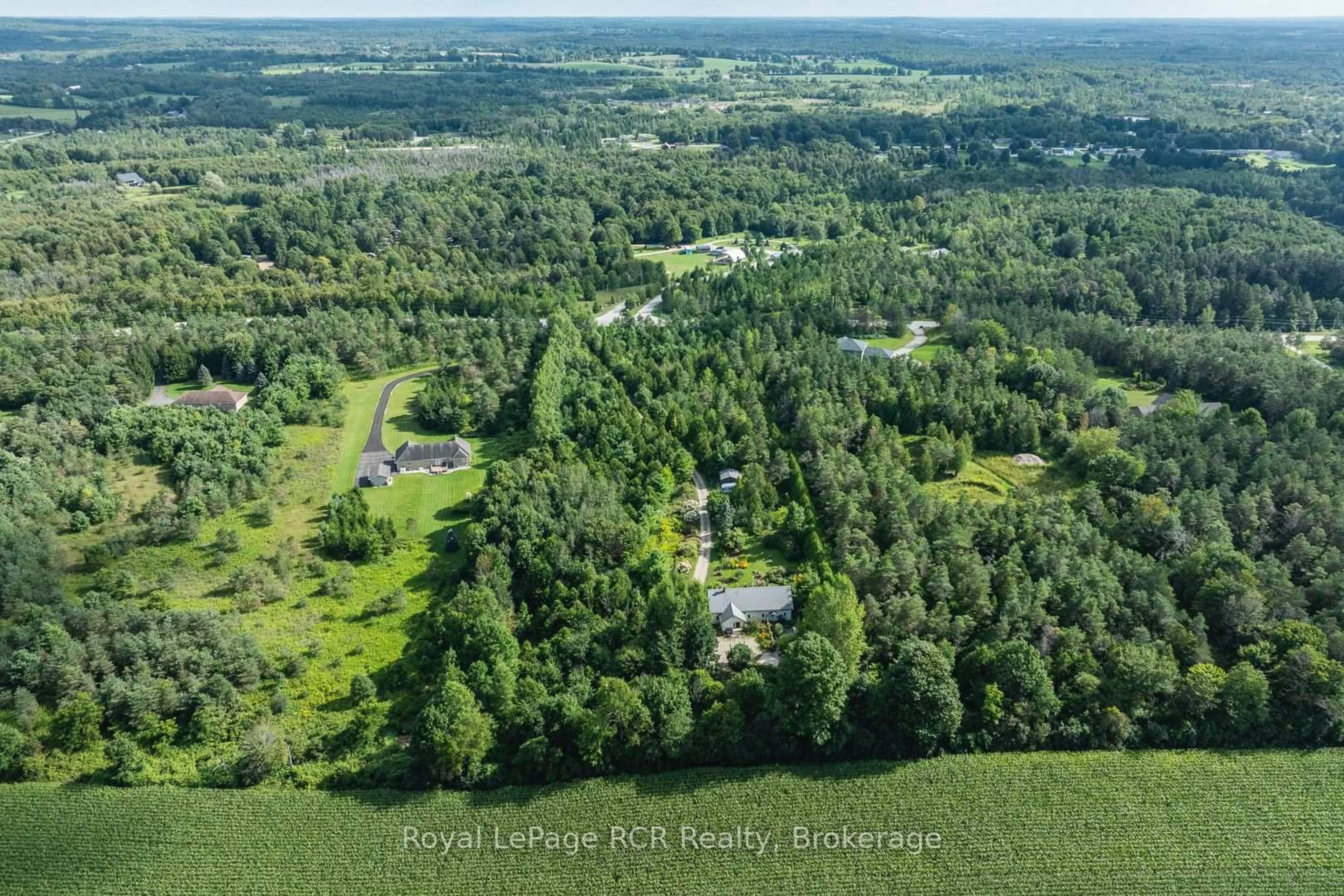 A pic from outside/outdoor area/front of a property/back of a property/a pic from drone, forest/trees view for 323199 Durham Rd, West Grey Ontario N0G 1R0