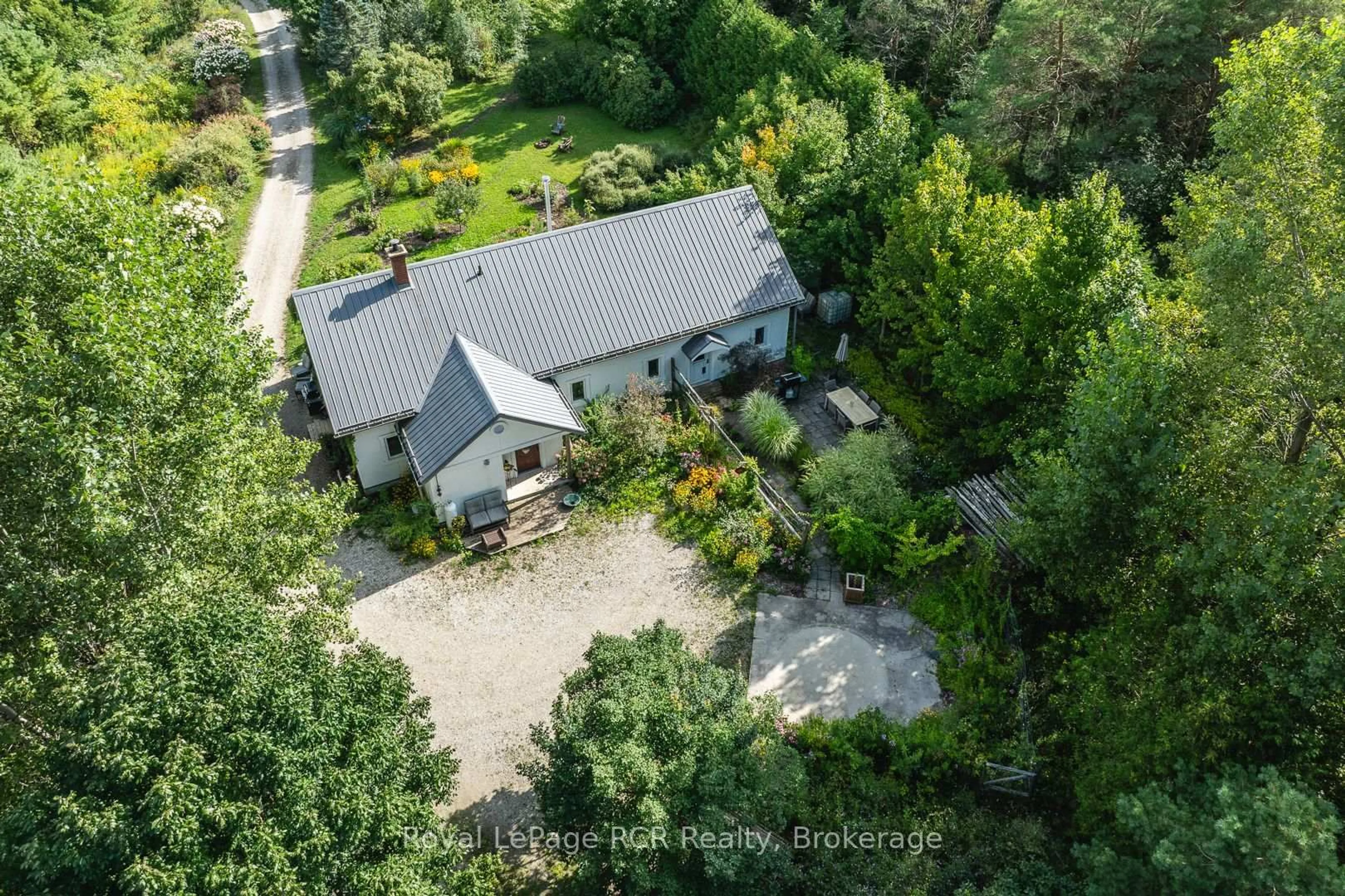 A pic from outside/outdoor area/front of a property/back of a property/a pic from drone, street for 323199 Durham Rd, West Grey Ontario N0G 1R0
