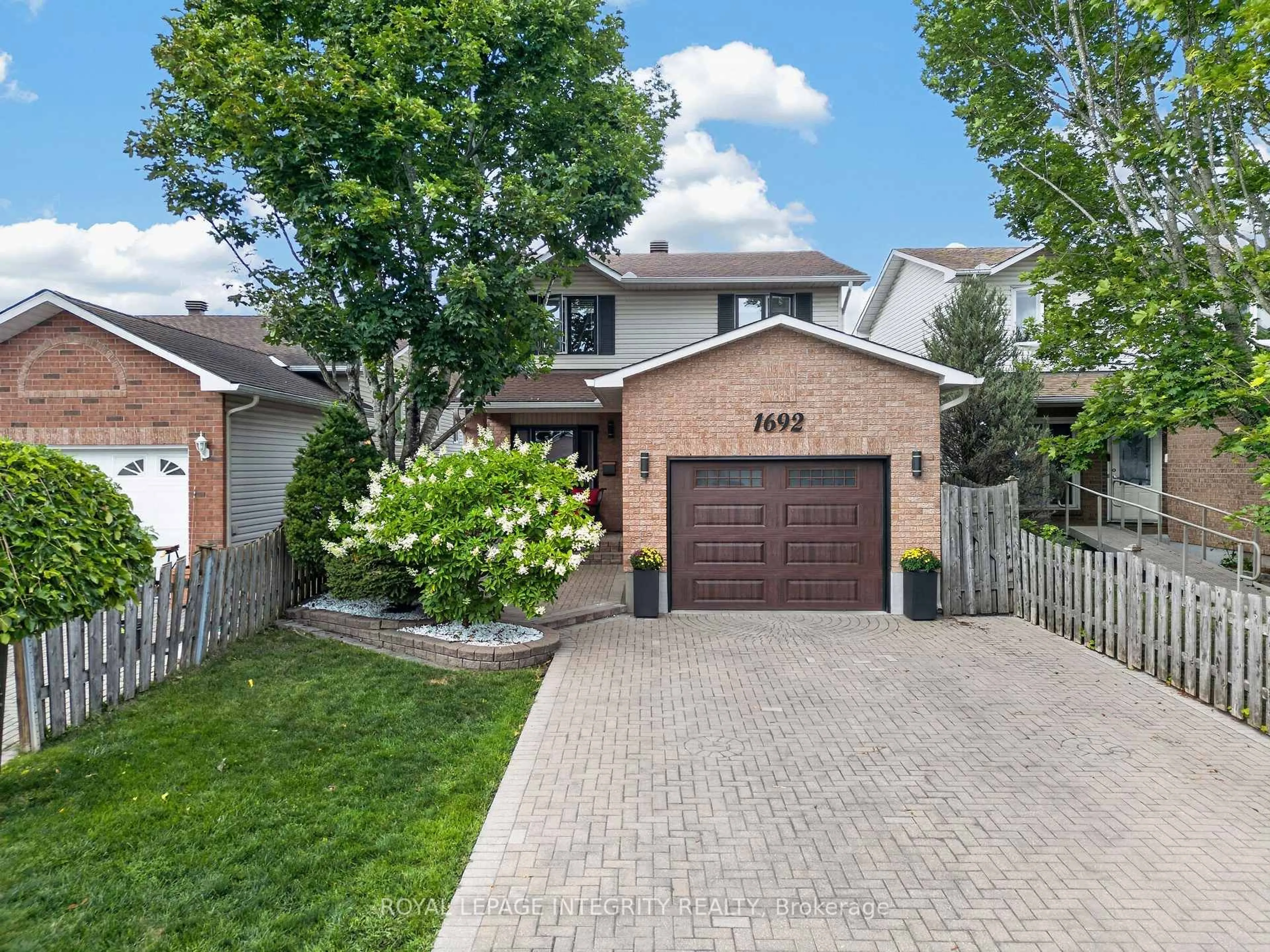 Home with brick exterior material, street for 1692 Toulouse Cres, Ottawa Ontario K1C 6K3