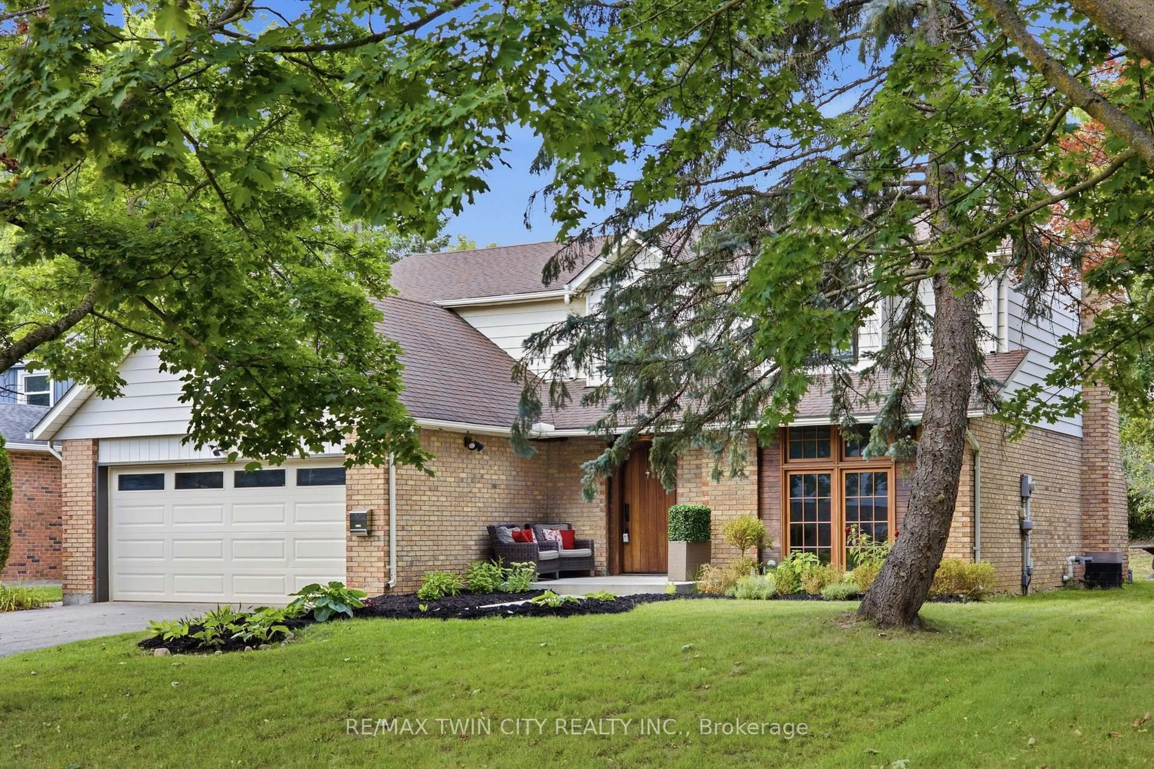 Home with brick exterior material, street for 416 Clairbrook Cres, Waterloo Ontario N2L 5V7