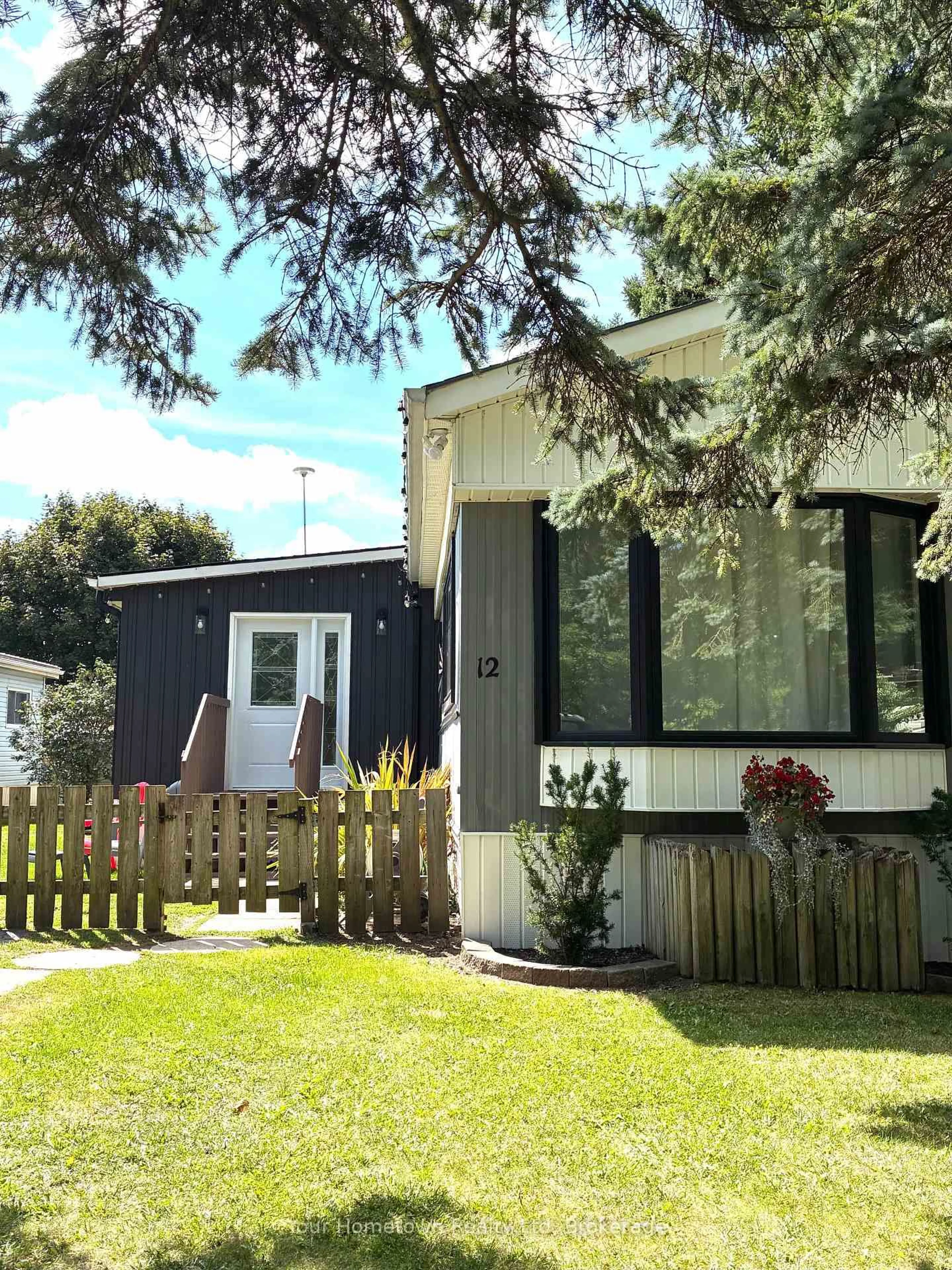 Home with vinyl exterior material, street for 12 Second Ave, Centre Wellington Ontario N1M 2W5