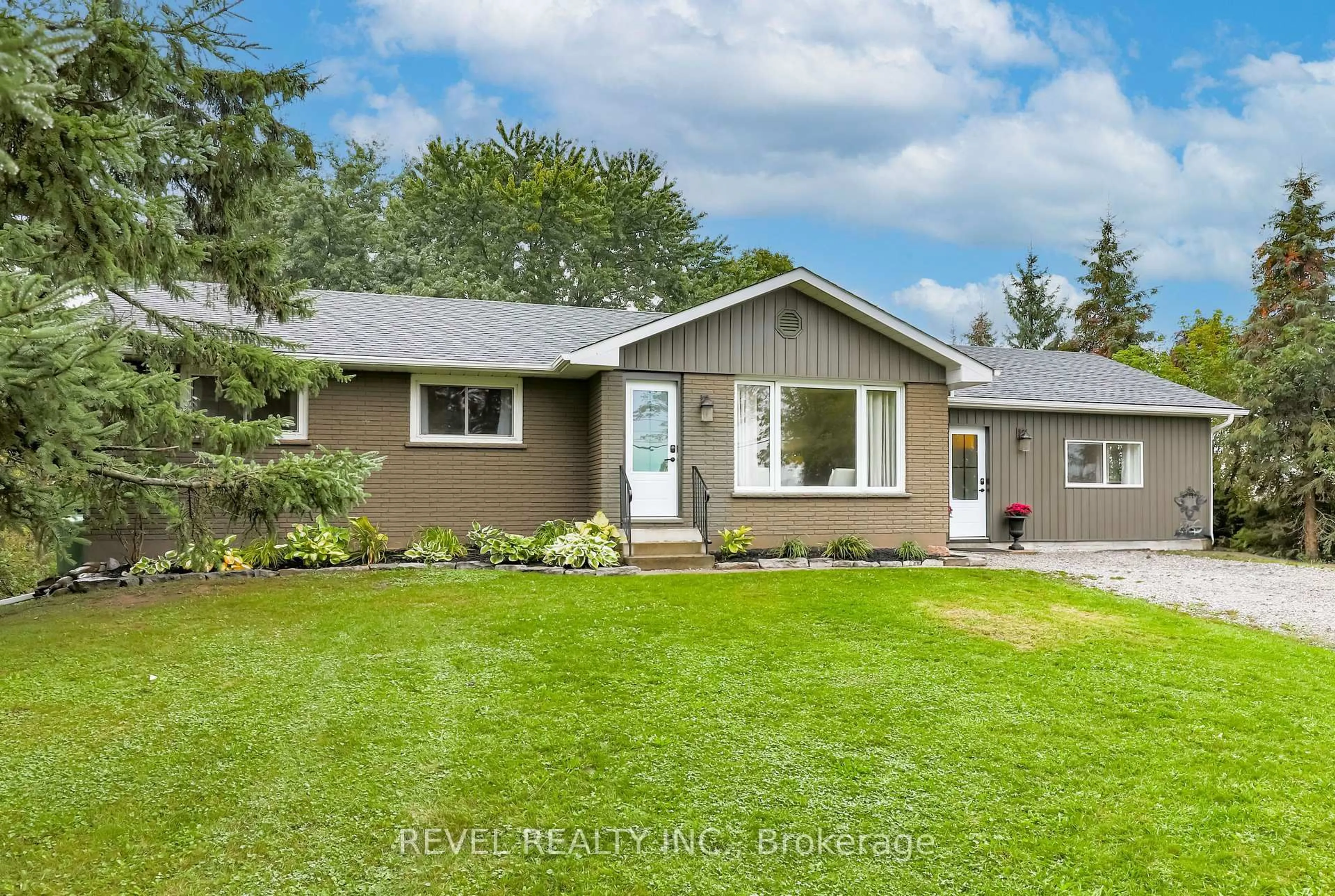 Home with vinyl exterior material, street for 3880 Highway 35, Kawartha Lakes Ontario K0M 1G0