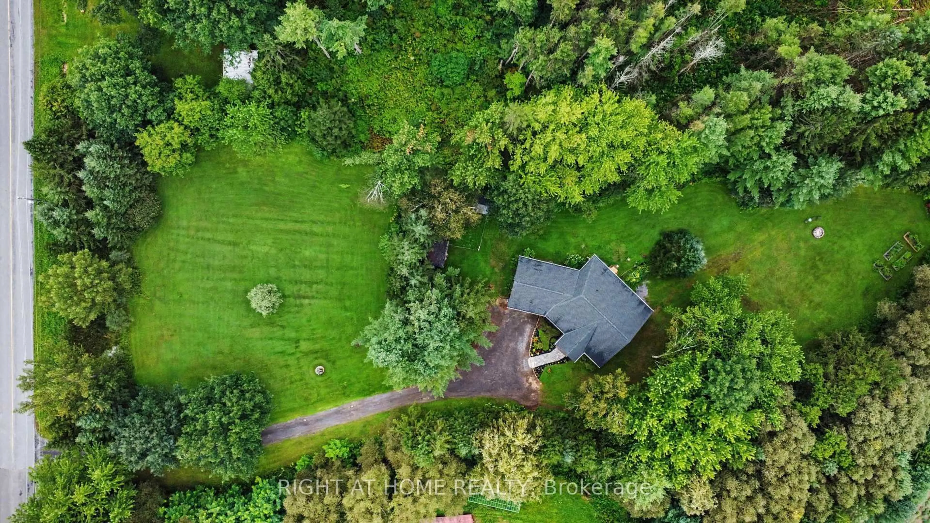 A pic from outside/outdoor area/front of a property/back of a property/a pic from drone, forest/trees view for 1280 Du Lac Chse, Clarence-Rockland Ontario K0A 3N0