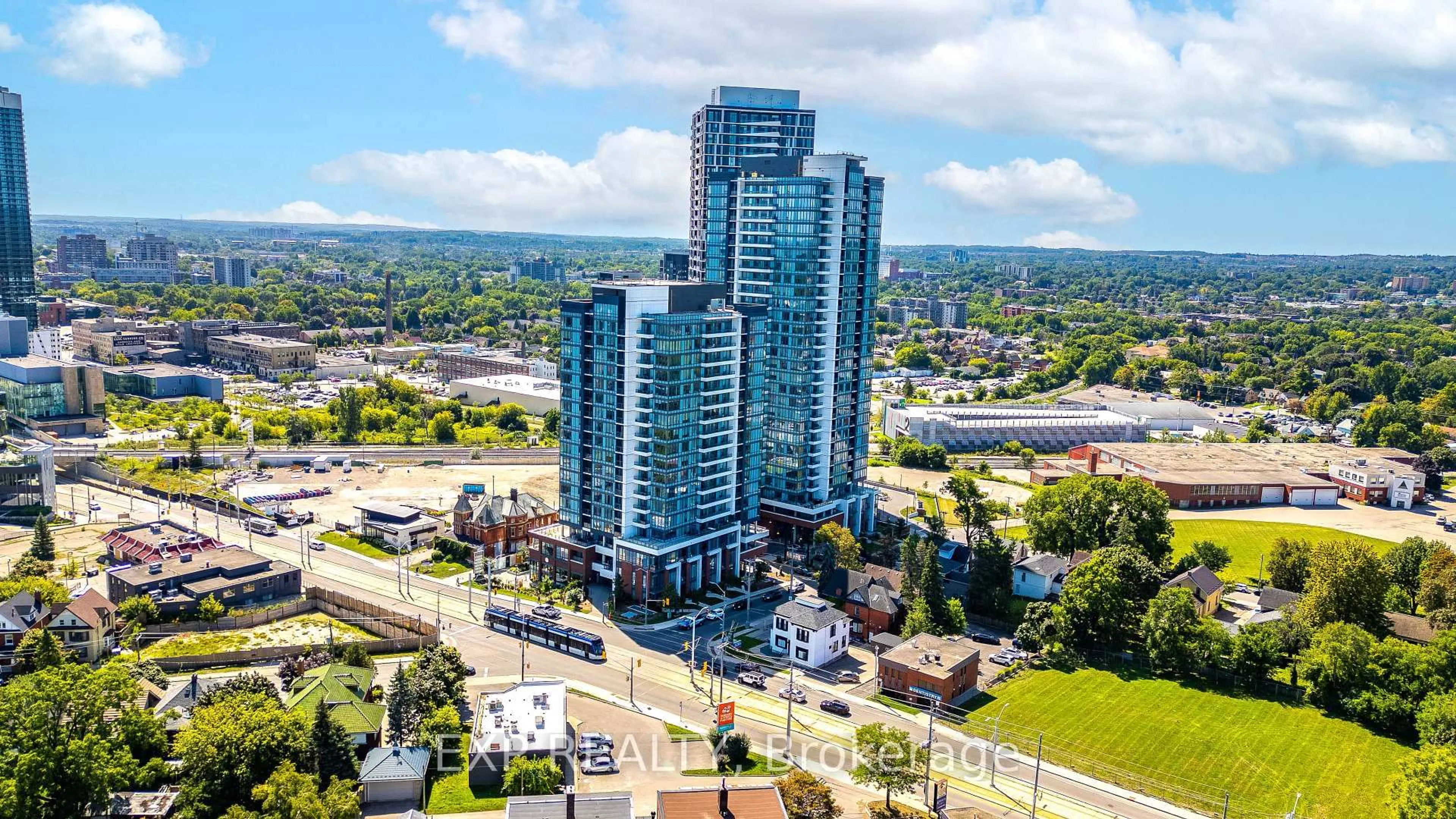 A pic from outside/outdoor area/front of a property/back of a property/a pic from drone, city buildings view from balcony for 5 Wellington St #1011, Kitchener Ontario N2G 1C7