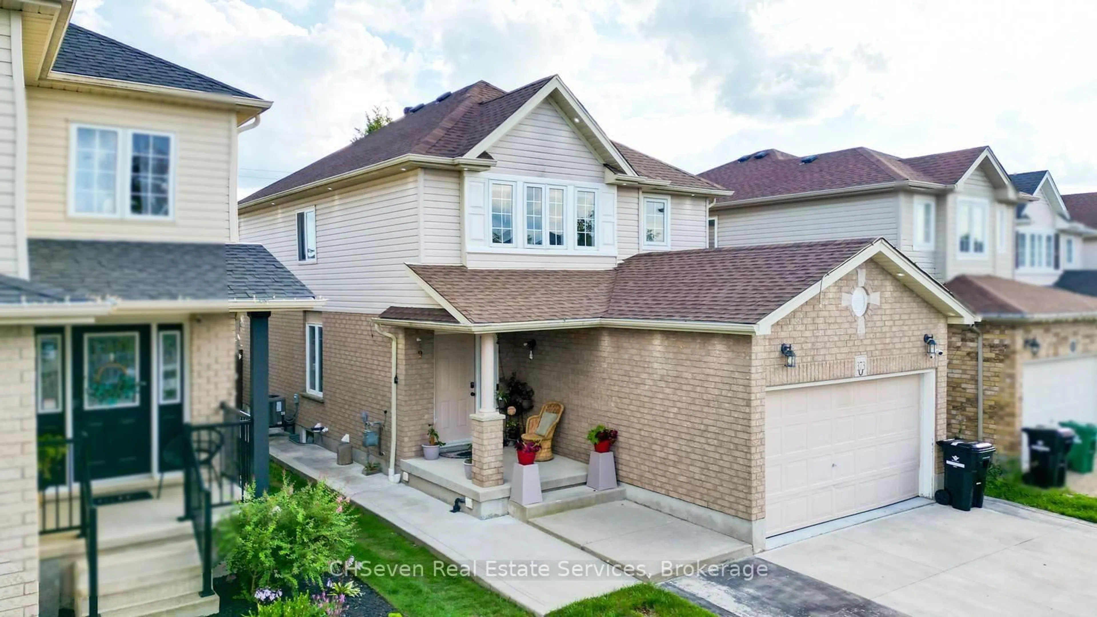 Home with brick exterior material, street for 373 Thomas Slee Dr, Kitchener Ontario N2P 2X5