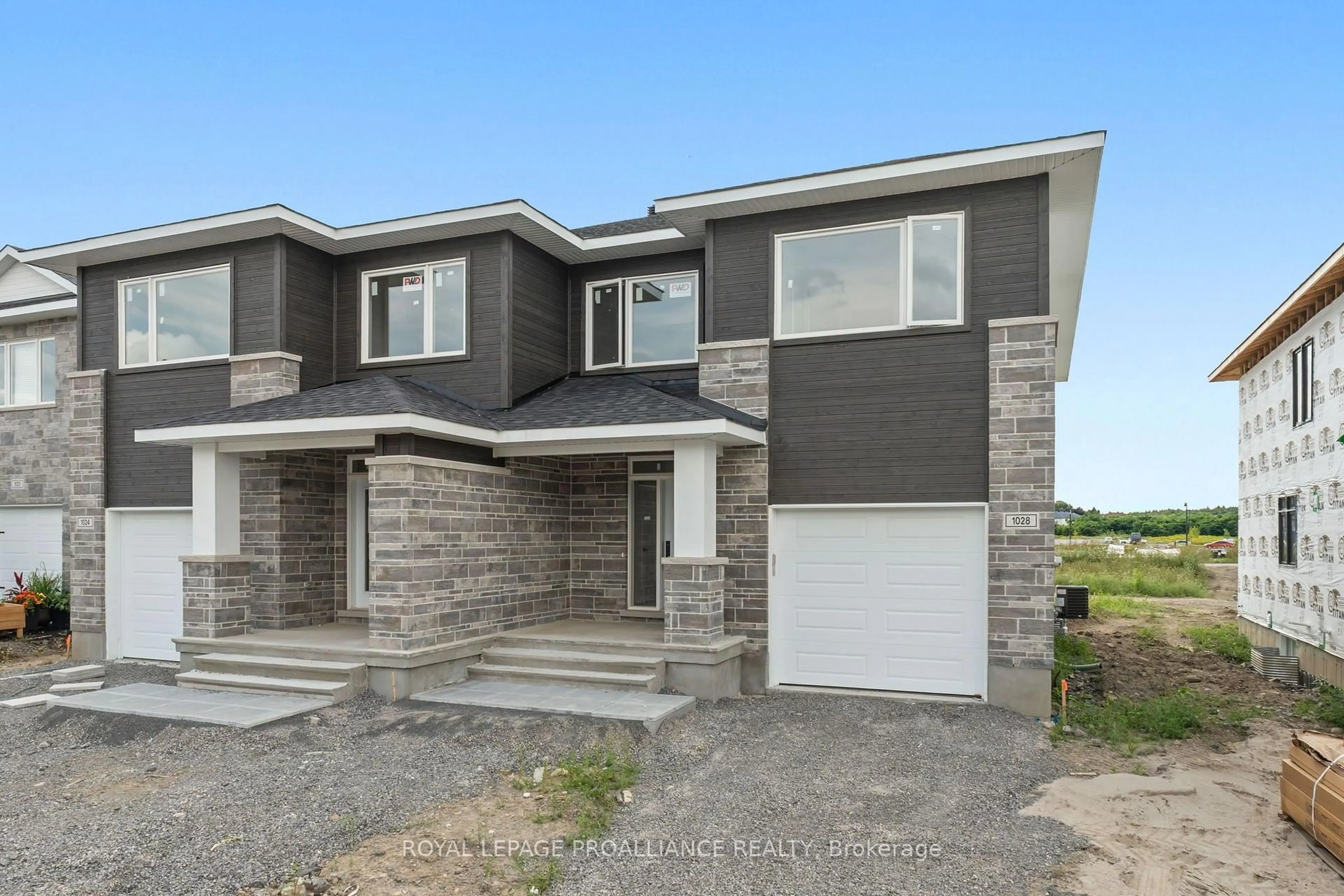 Home with brick exterior material, street for 1028 Moore St, Brockville Ontario K6V 0H2