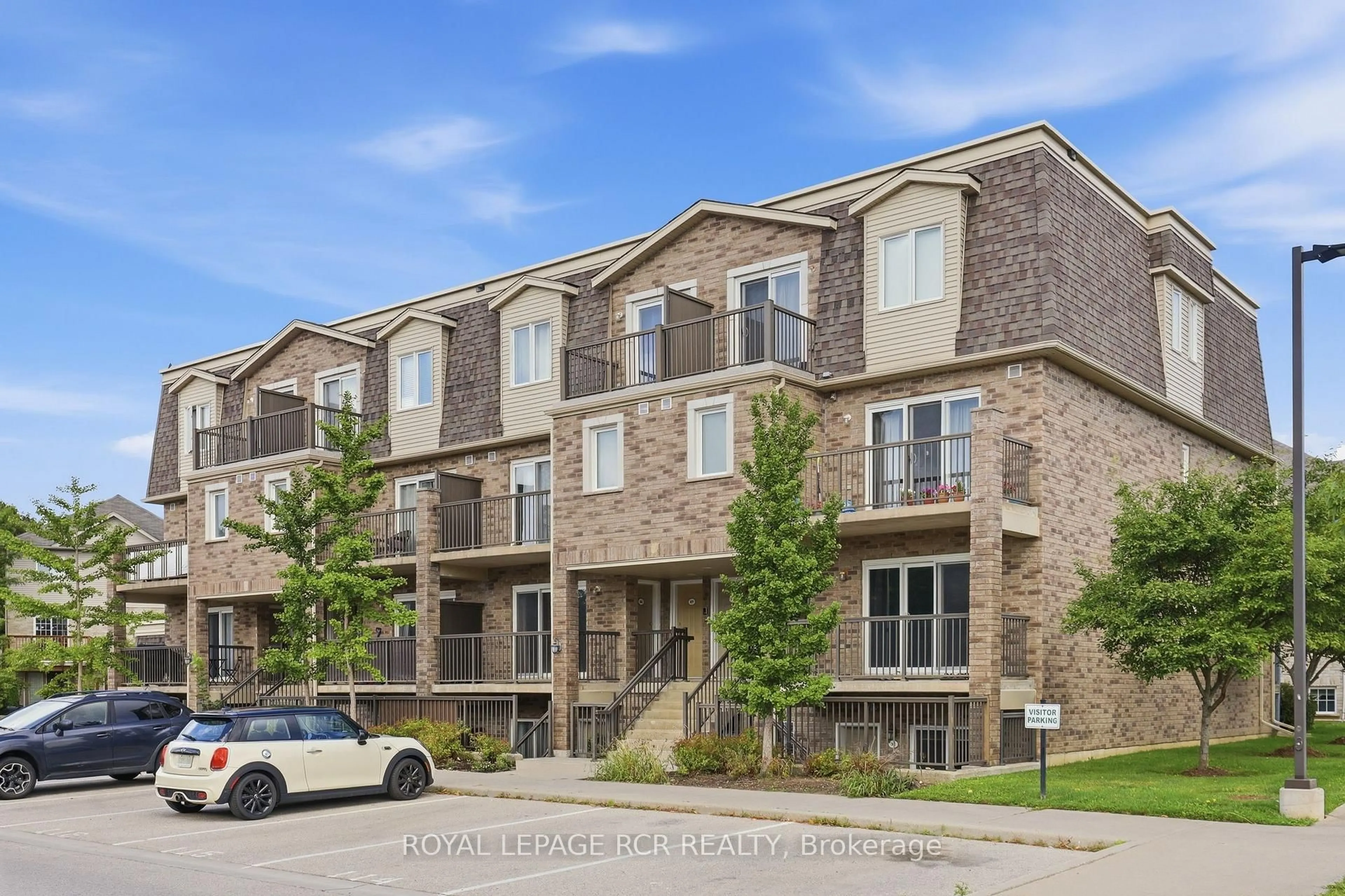 Home with brick exterior material, street for 35 MOUNTFORD Dr #25, Guelph Ontario N1E 0G6