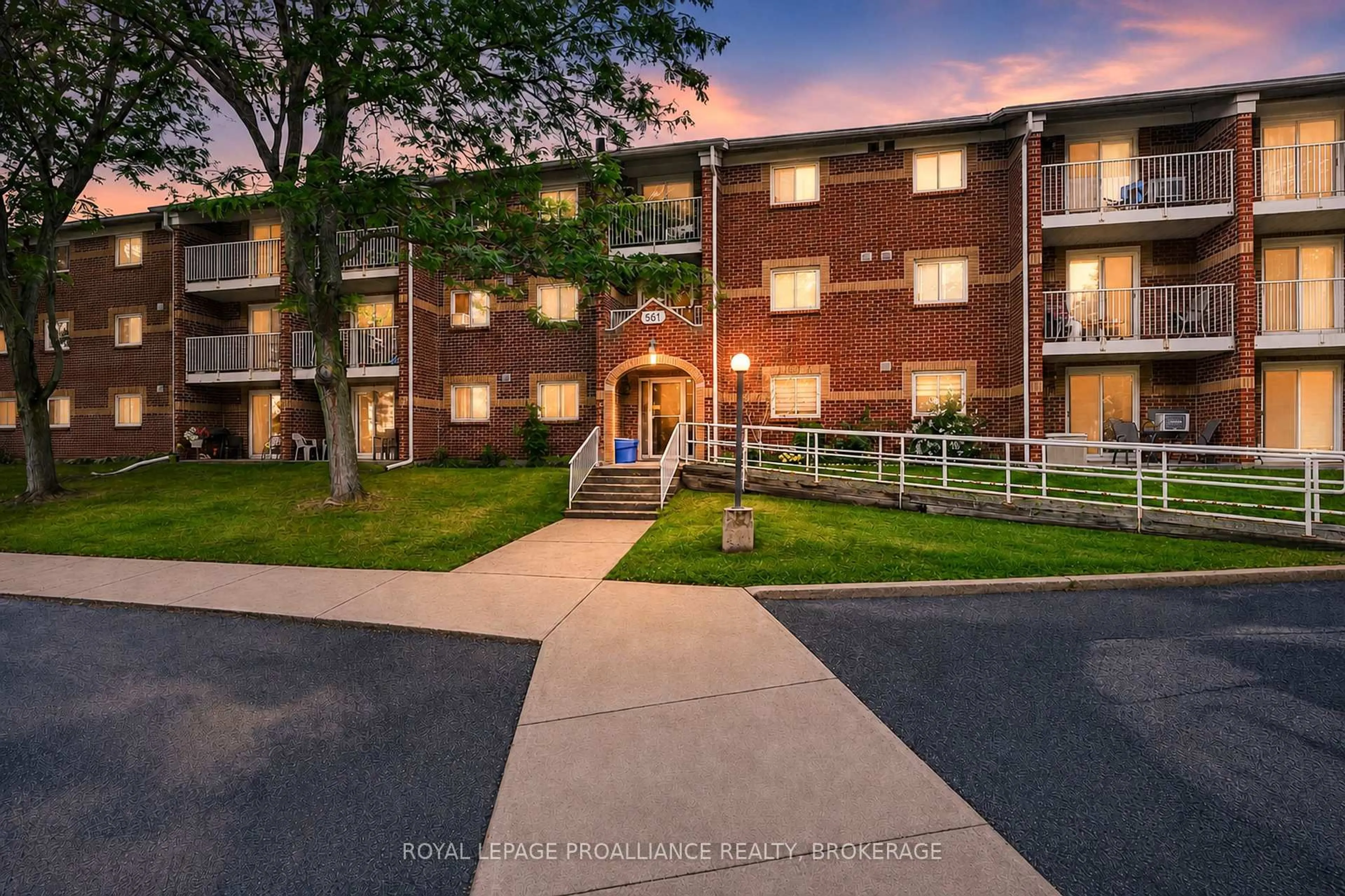 A pic from outside/outdoor area/front of a property/back of a property/a pic from drone, building for 561 Armstrong Rd #210, Kingston Ontario K7M 8J9